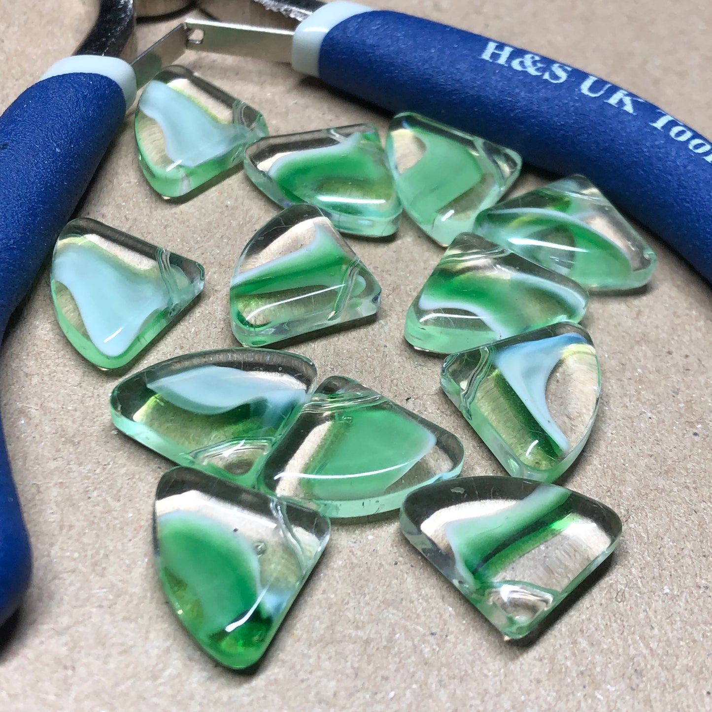 Green fan shaped glass beads