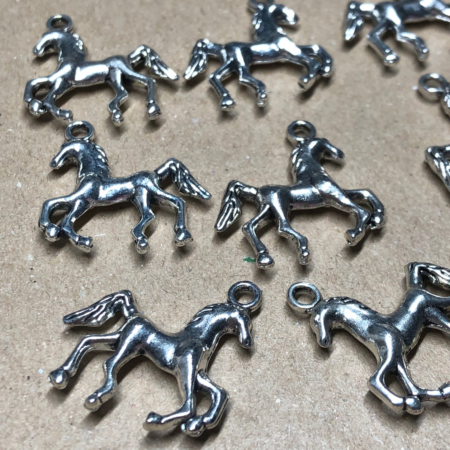 Twelve pony horse charms