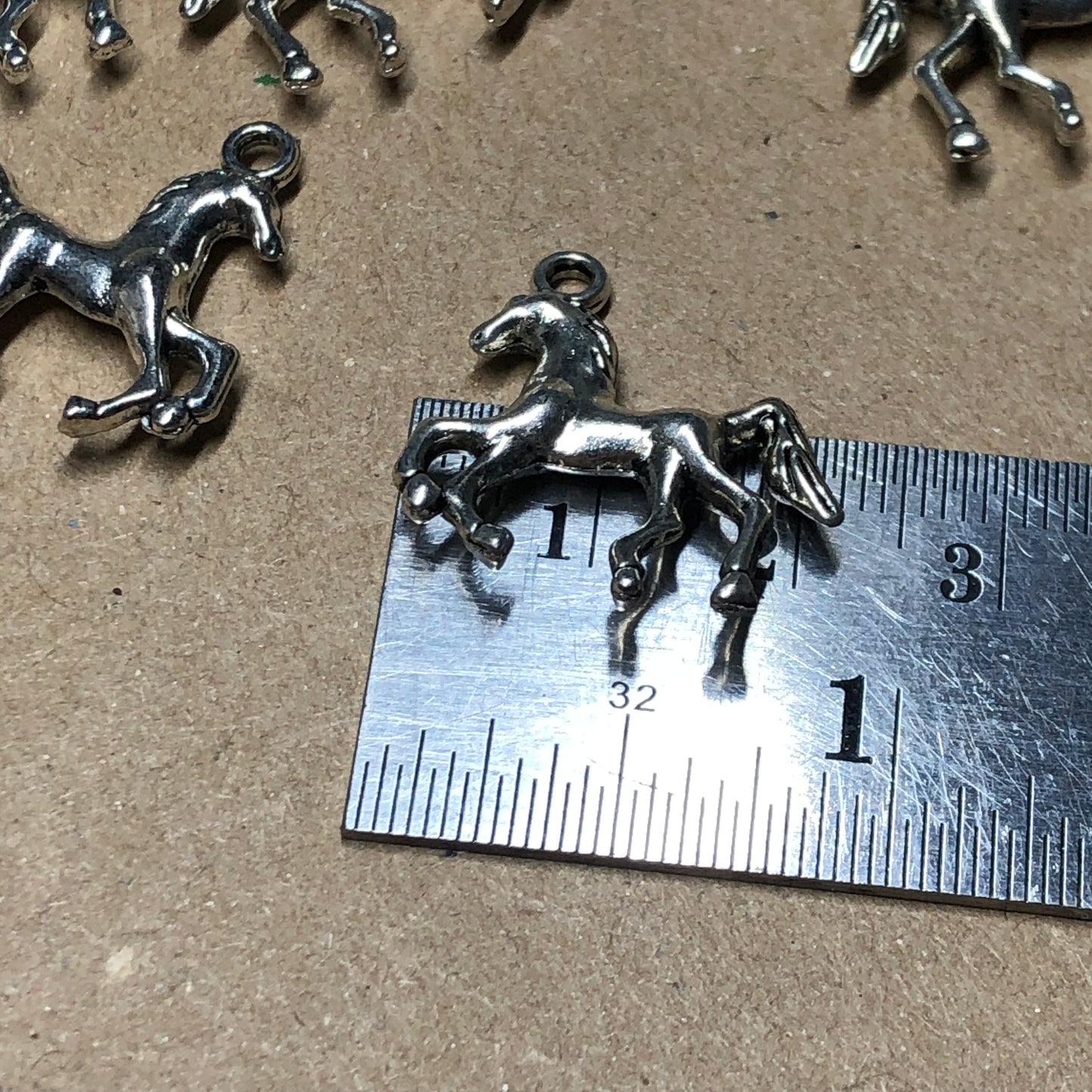 Twelve pony horse charms