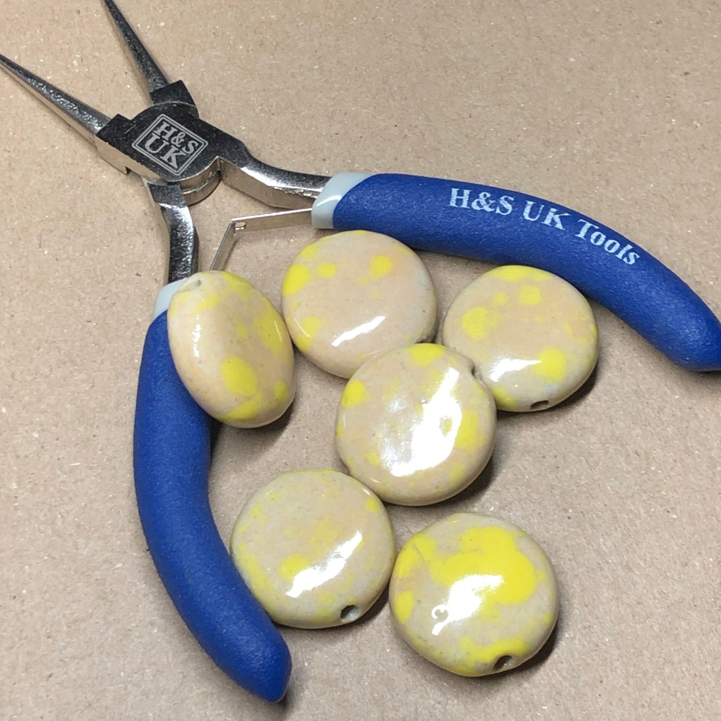 Large yellow and tan ceramic coin beads