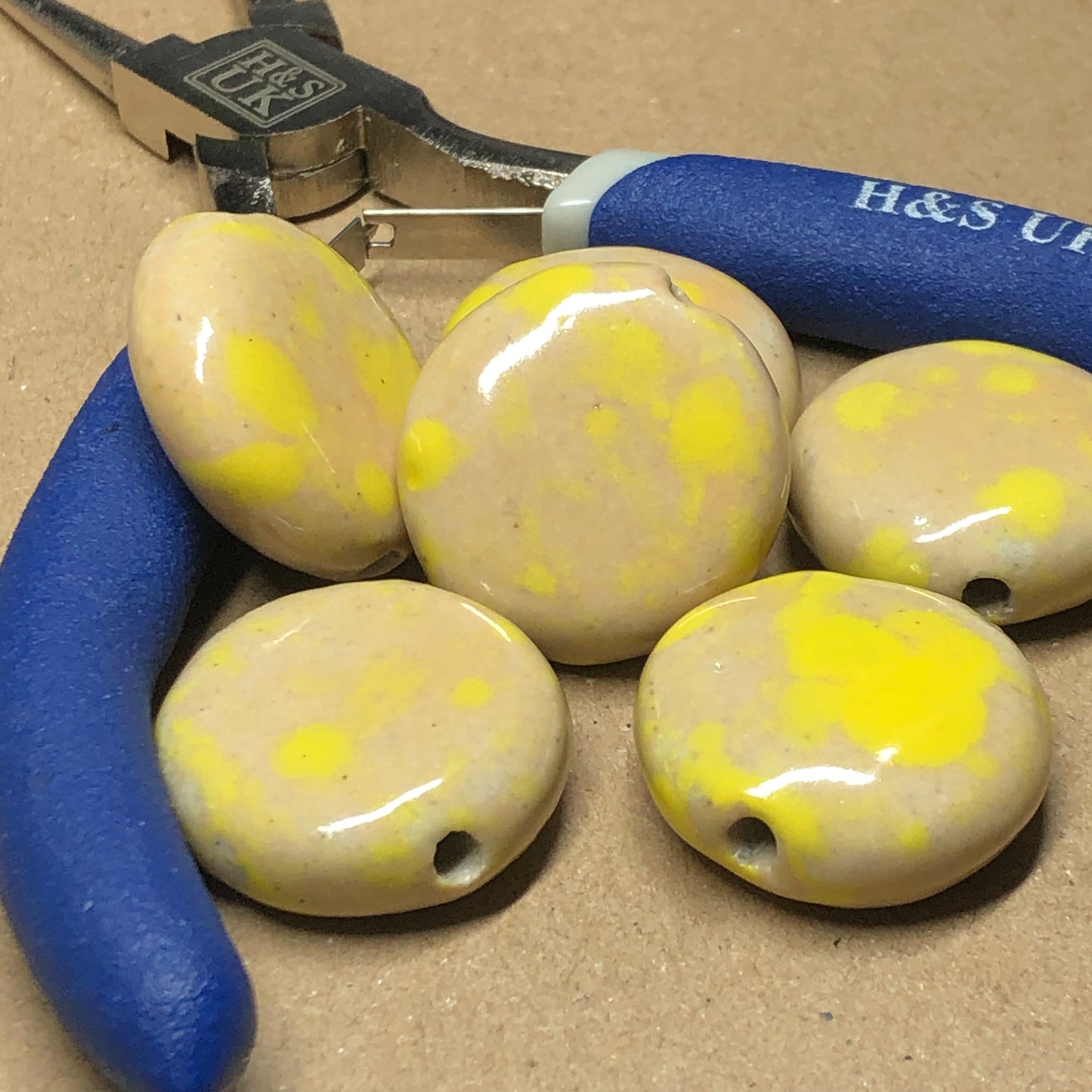 Large yellow and tan ceramic coin beads