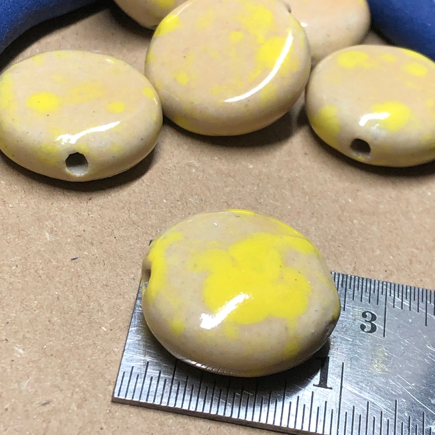 Large yellow and tan ceramic coin beads