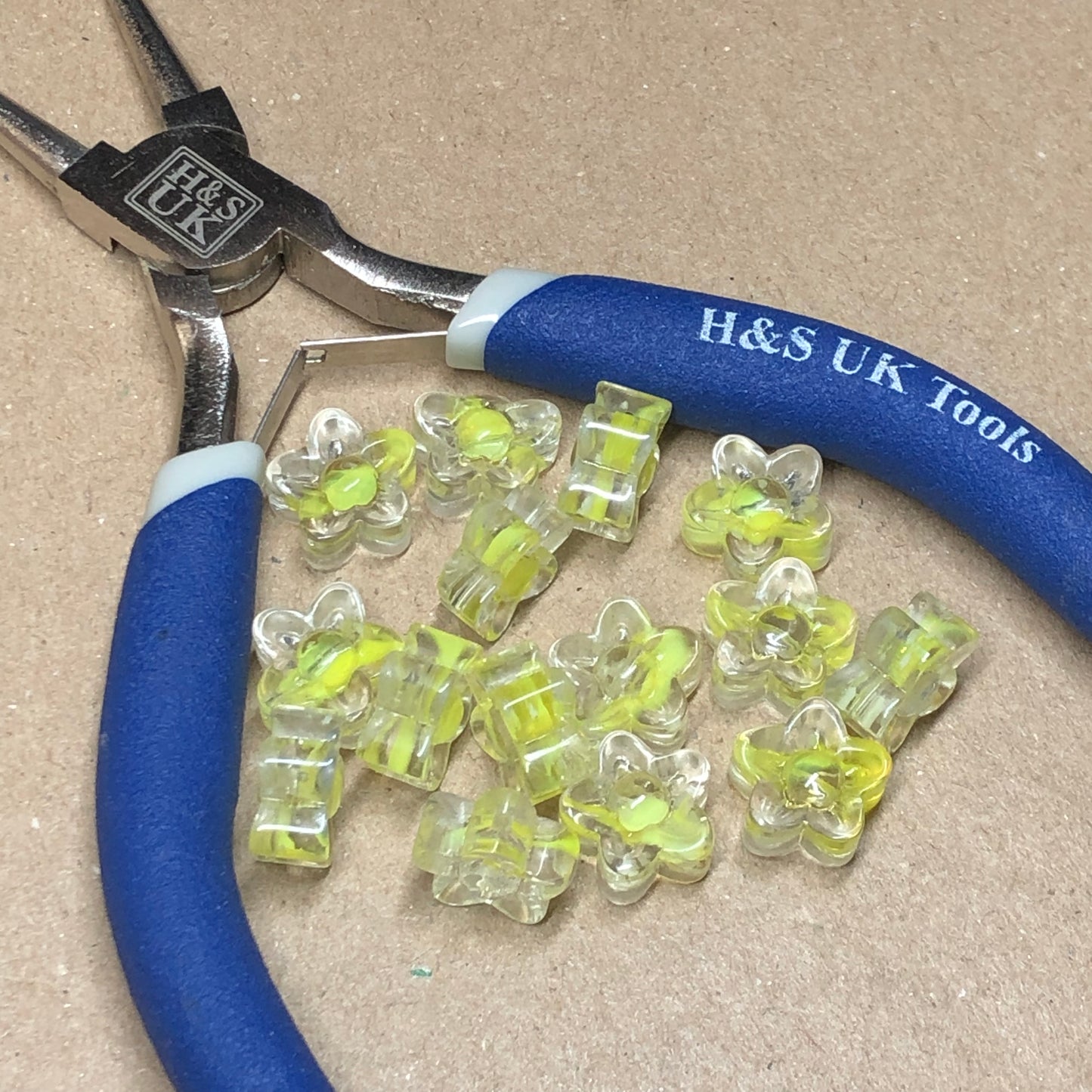 Yellow flower shaped glass beads