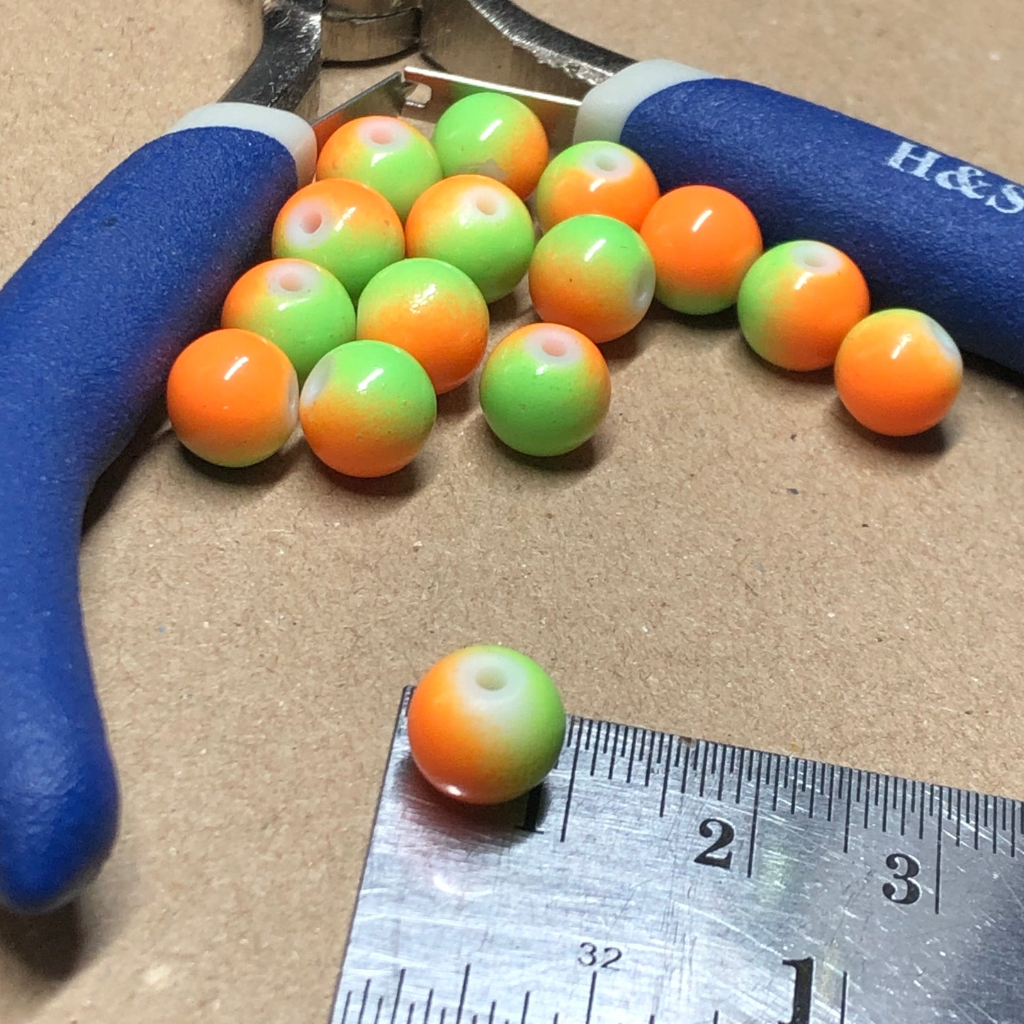 Orange and green round glass beads 8mm