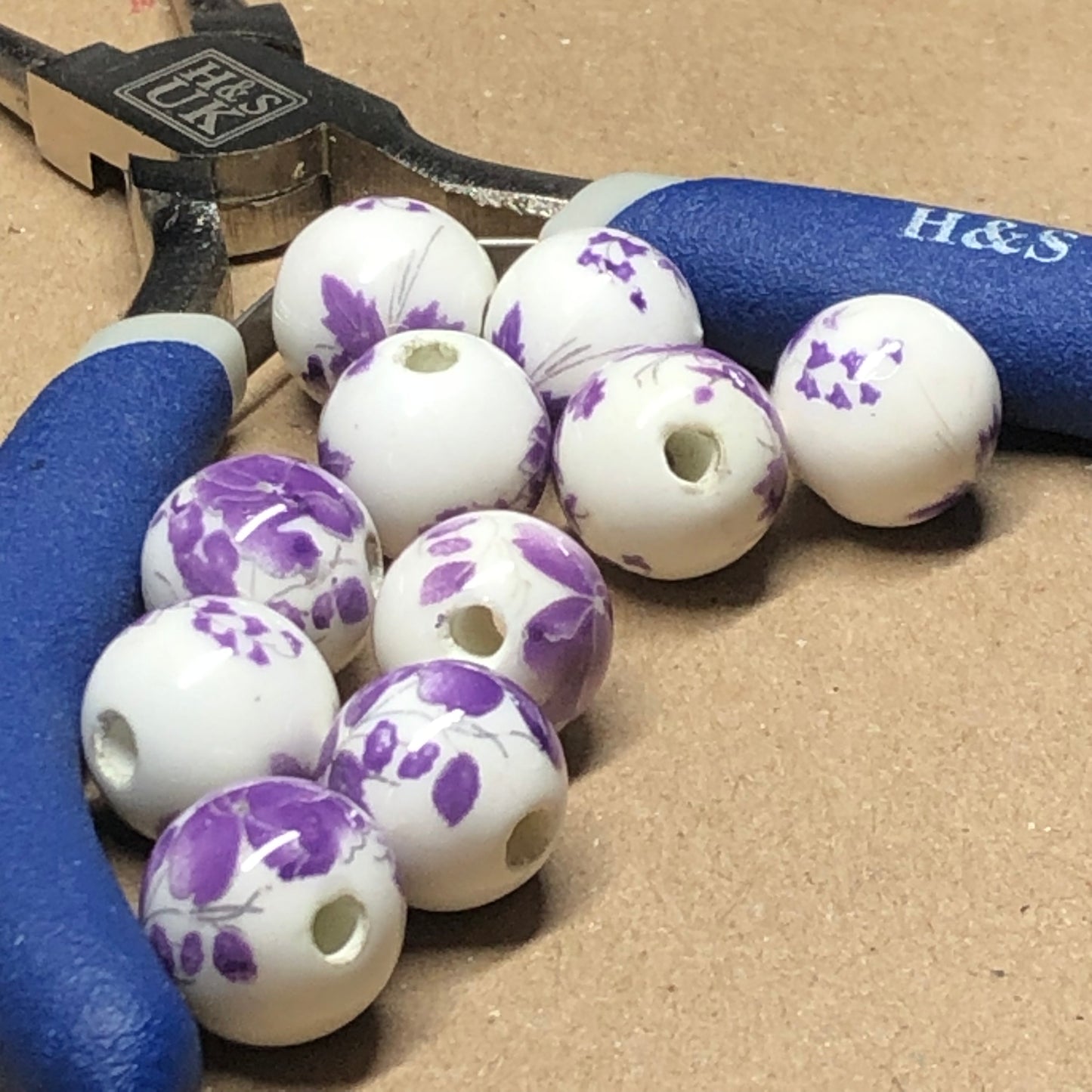 Purple and white flower printed ceramic beads