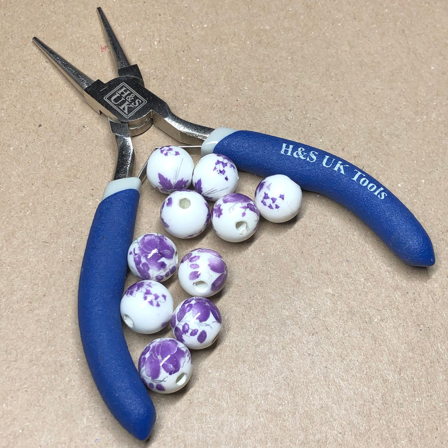 Purple and white flower printed ceramic beads