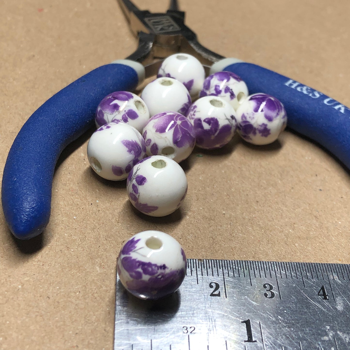 Purple and white flower printed ceramic beads