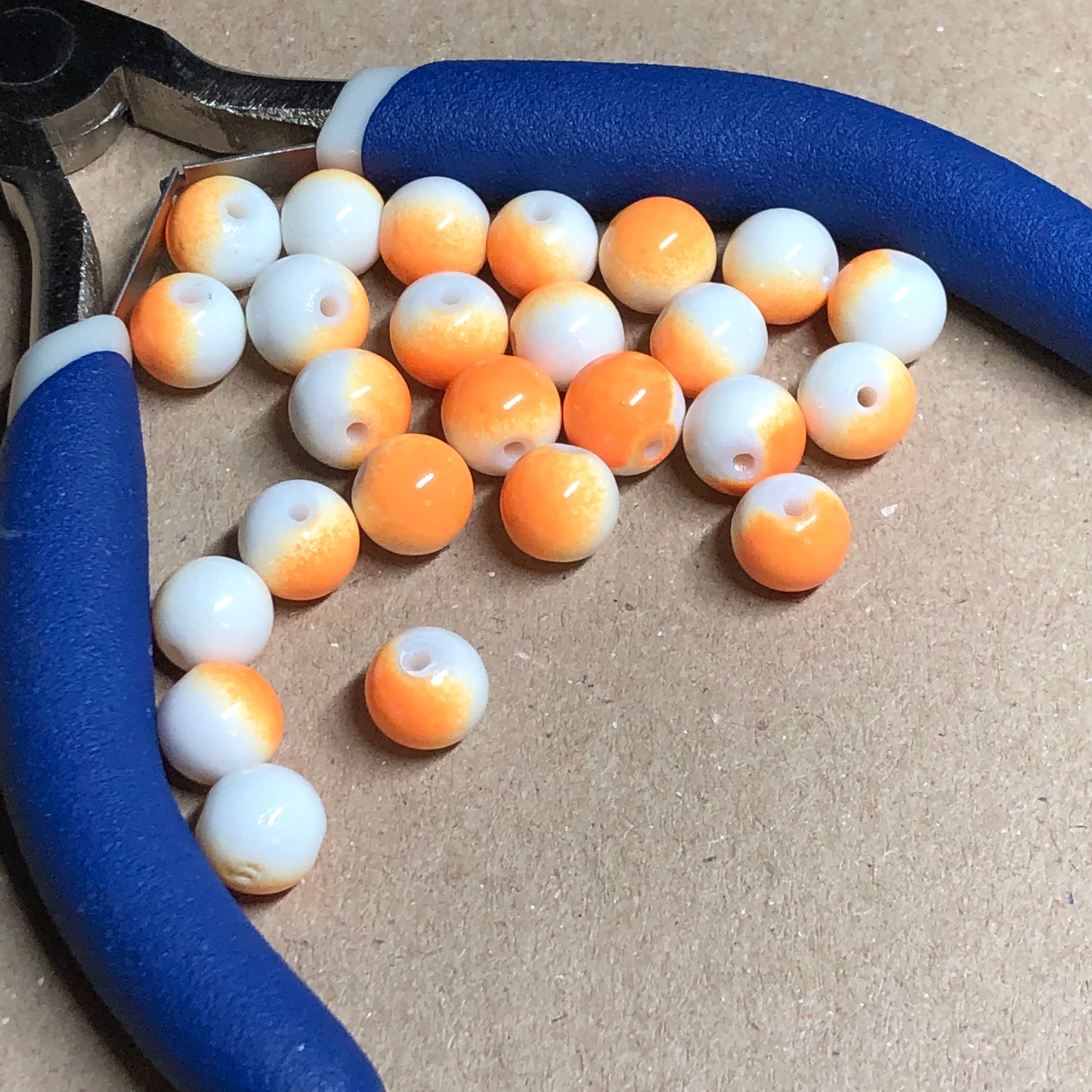 Two-tone orange and cream beads 8mm