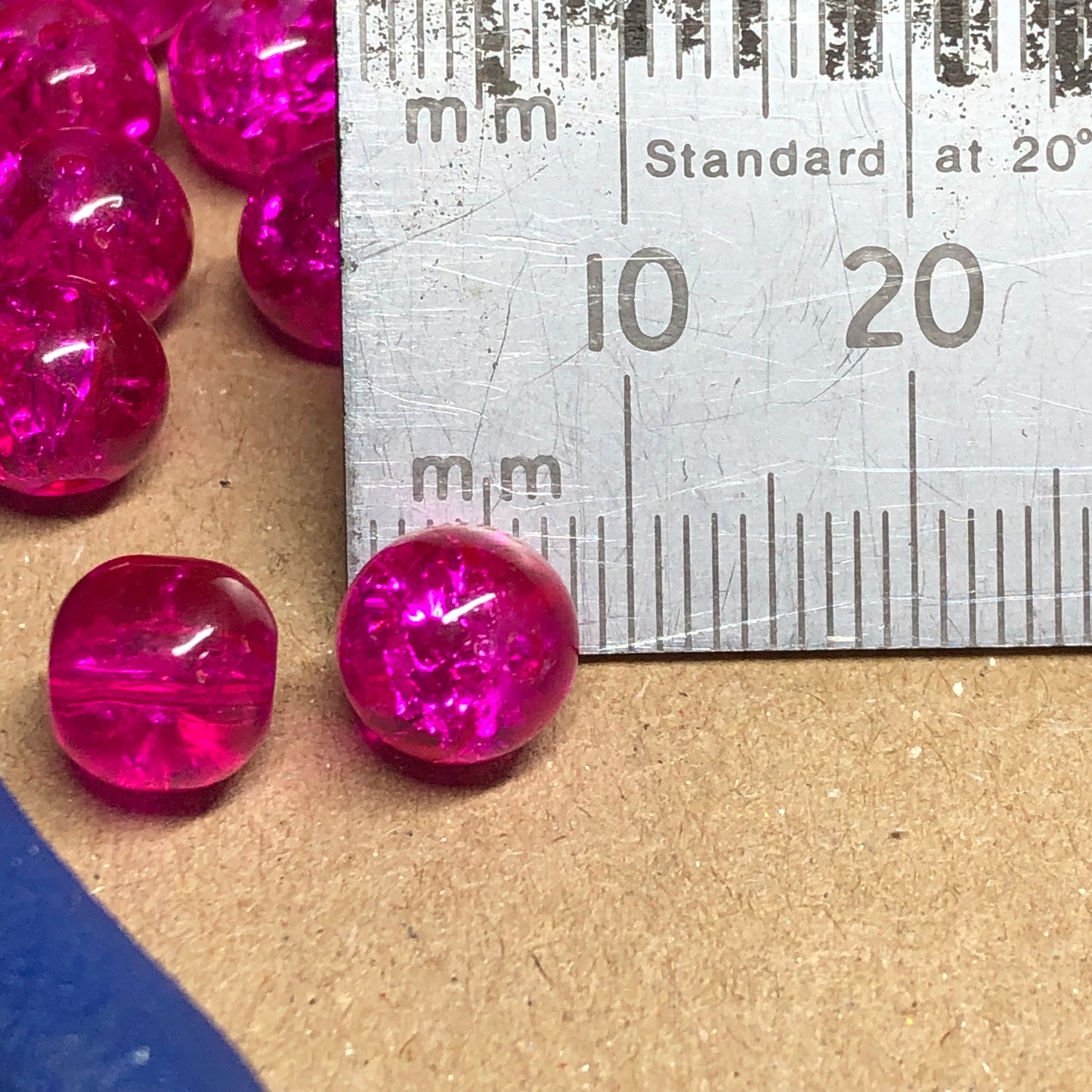 Mixed size bright pink crackle glass beads