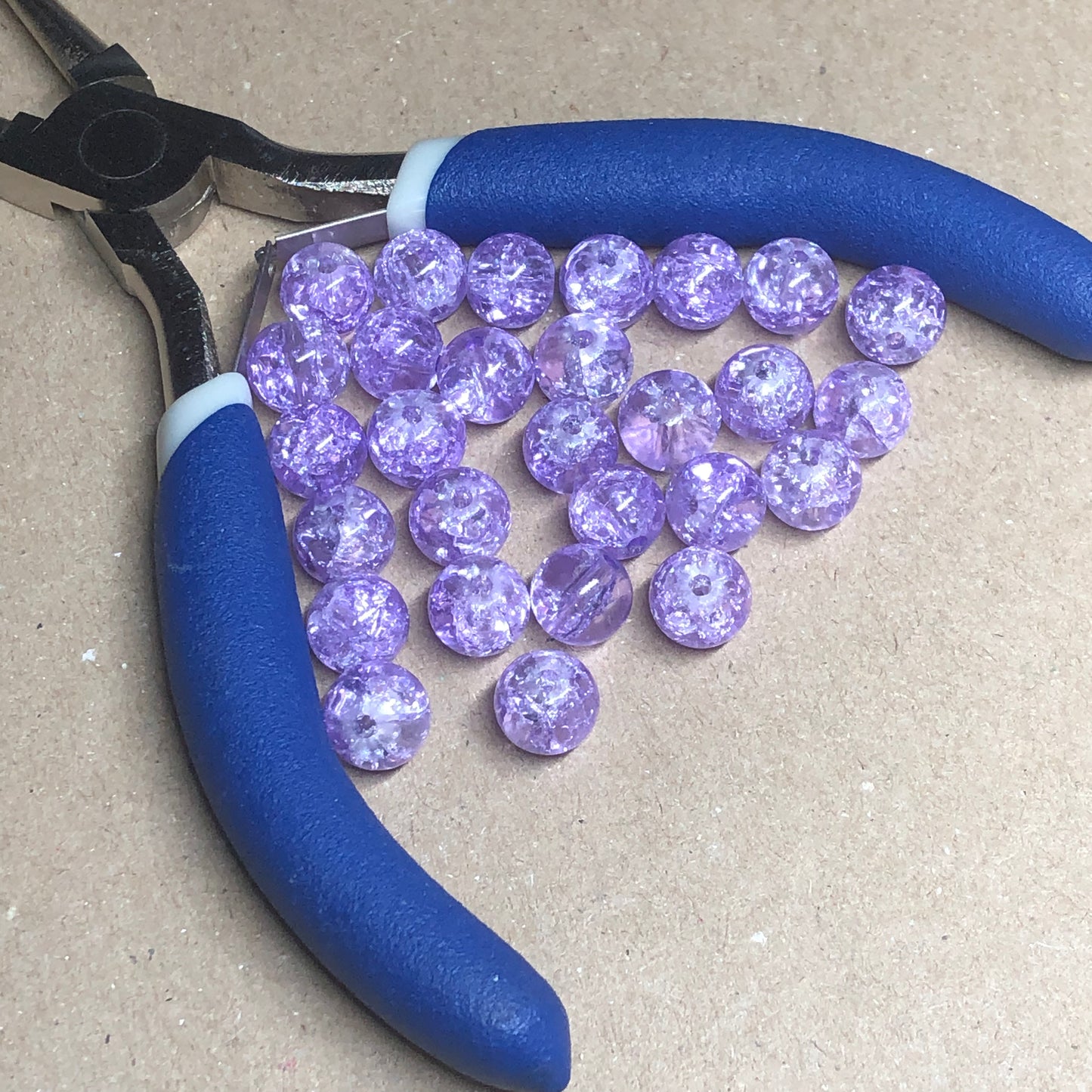 Light purple crackle glass beads