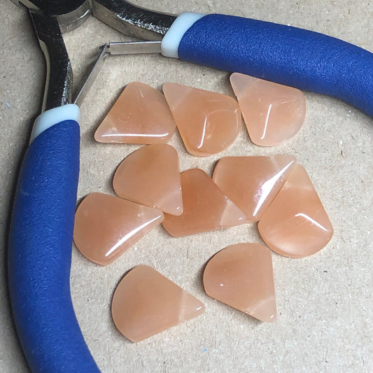 Opaque peach round edge fan glass beads