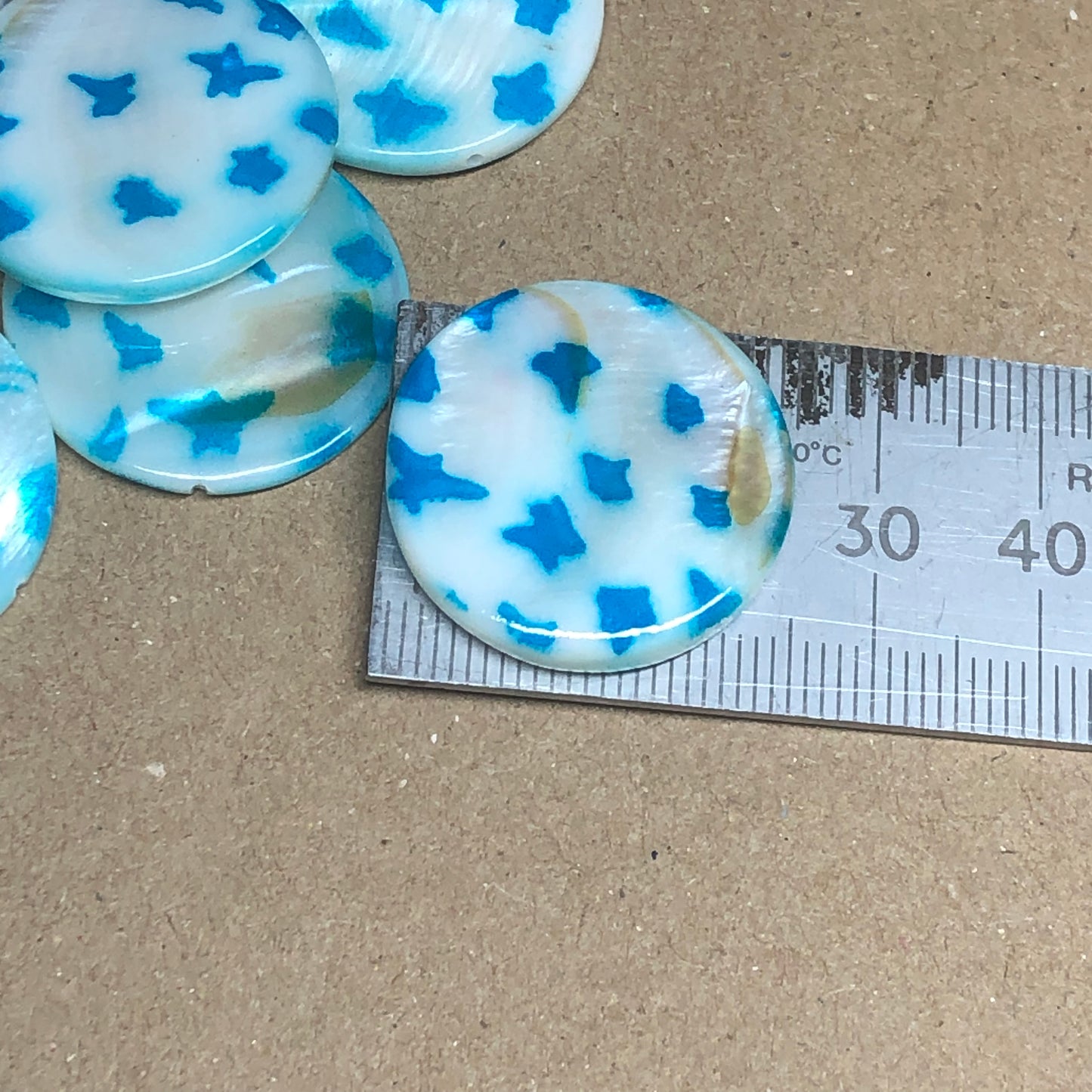 Blue star and moon printed shell beads