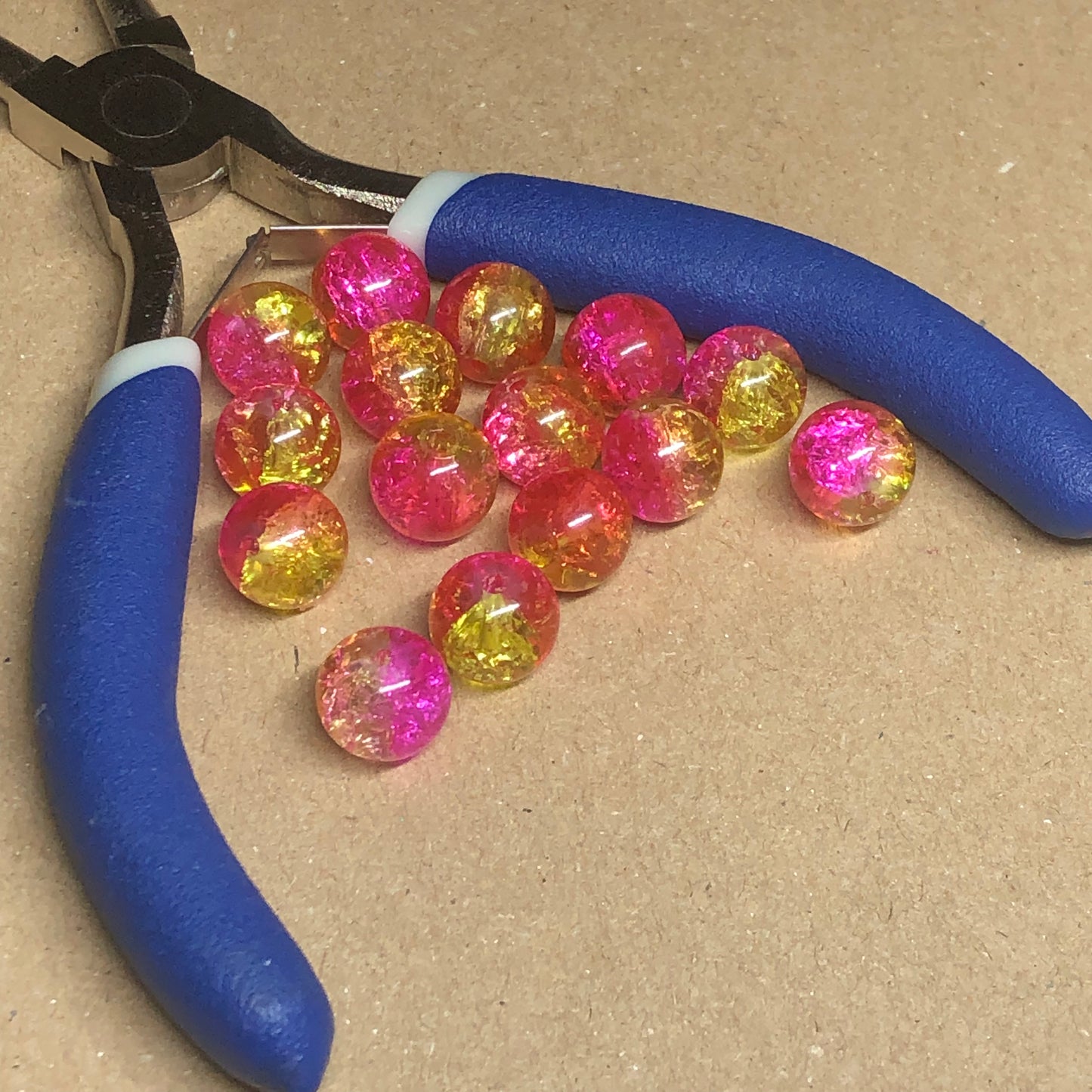 Two-tone pink and yellow crackle glass beads