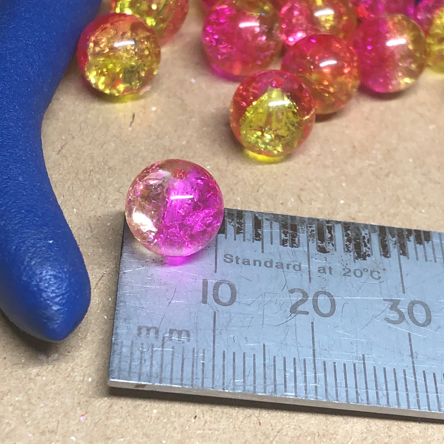 Two-tone pink and yellow crackle glass beads