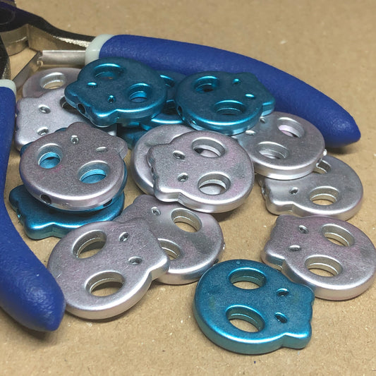 Blue and silver acrylic skull beads