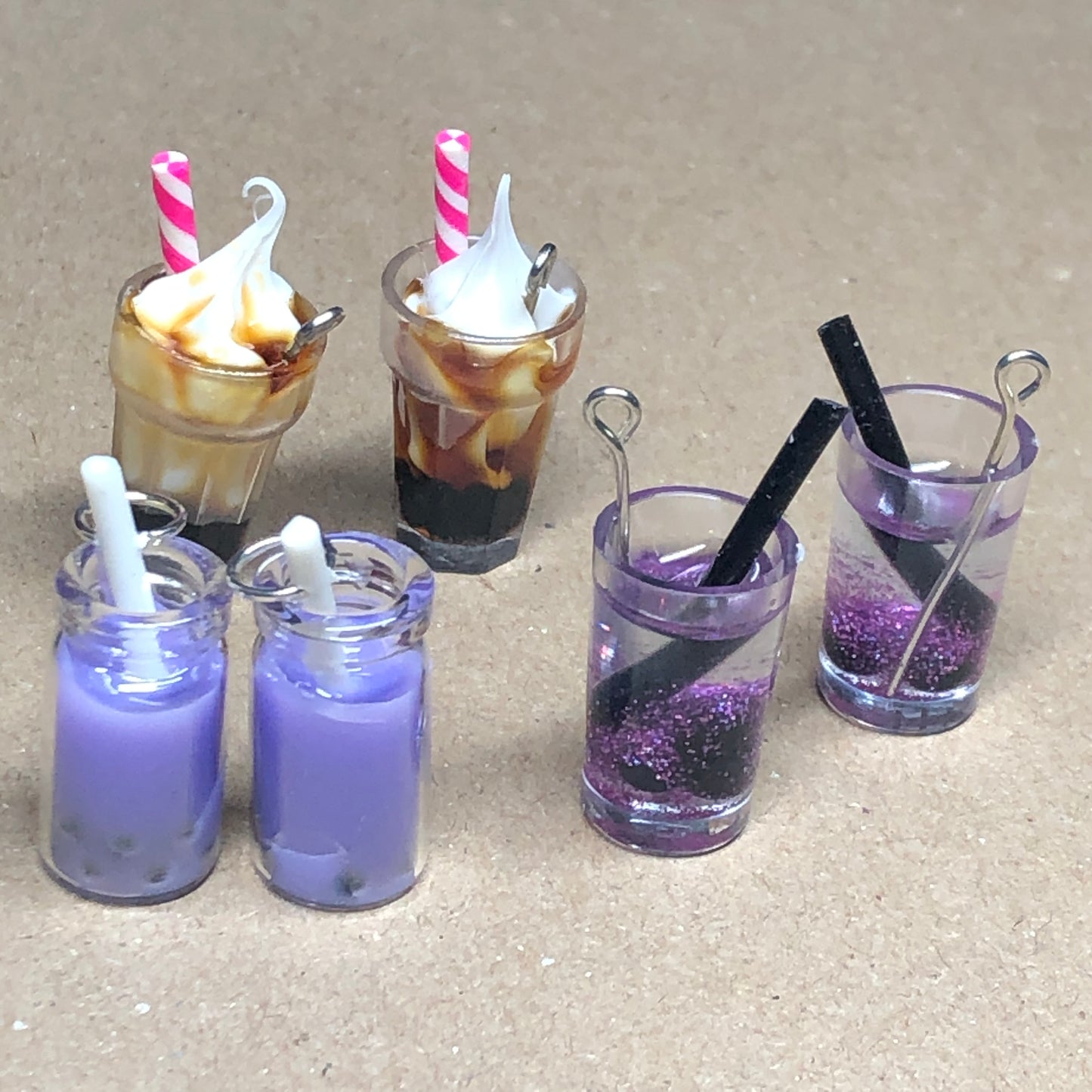 Six purple and brown ice cream sundae drink pendants