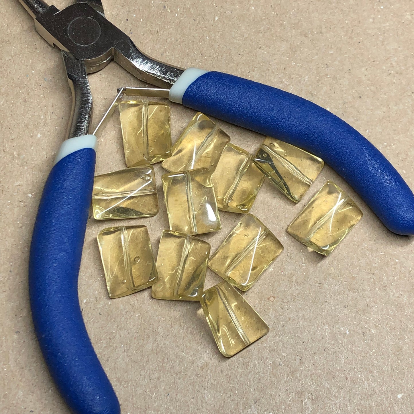 Yellow twisted rectangle glass beads