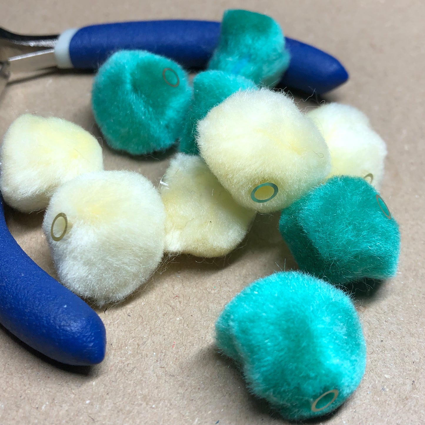 Green and yellow fur beads