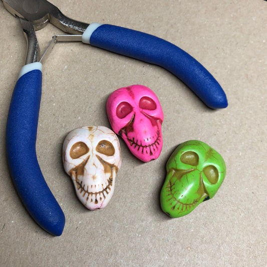 Three large Howlite skull beads