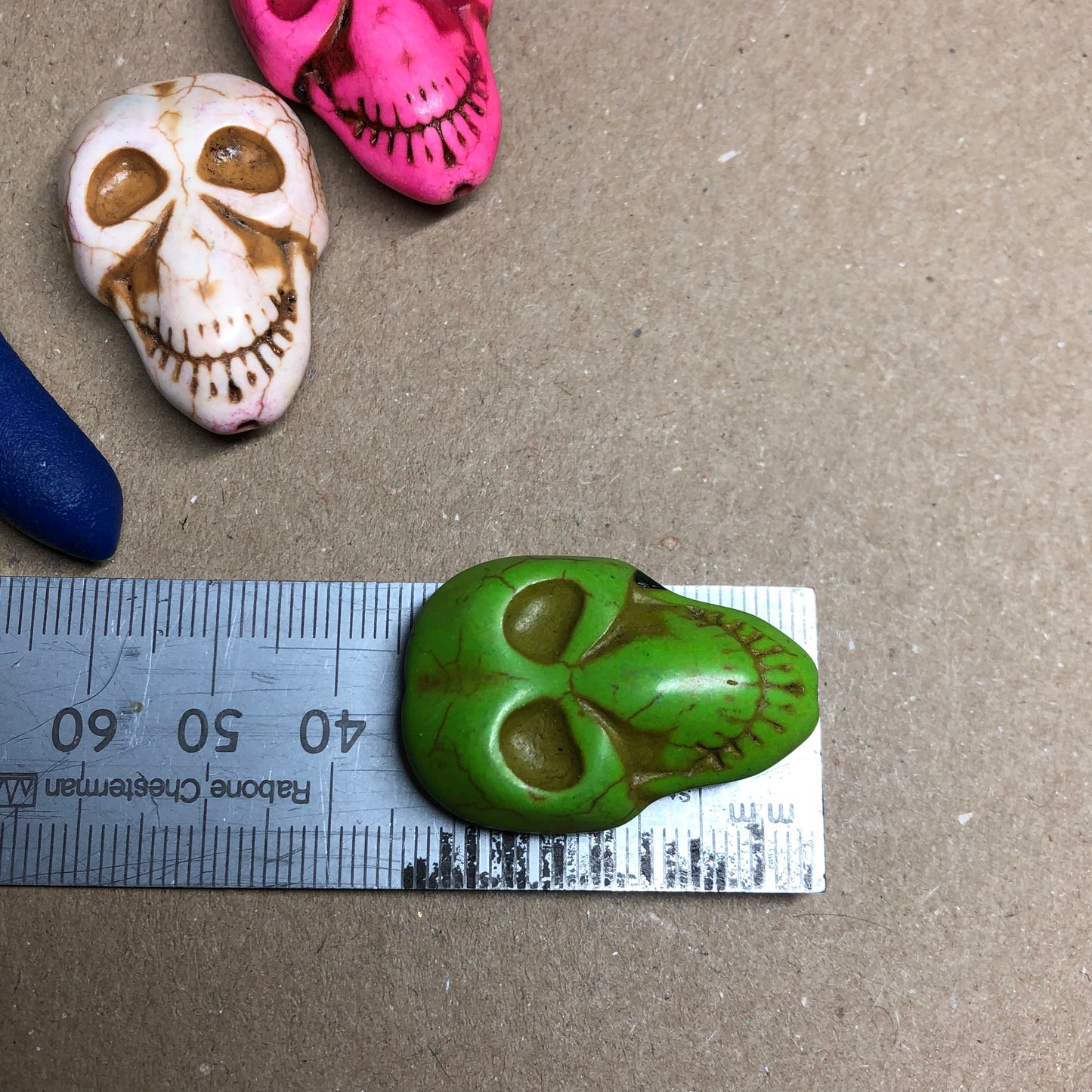 Three large Howlite skull beads