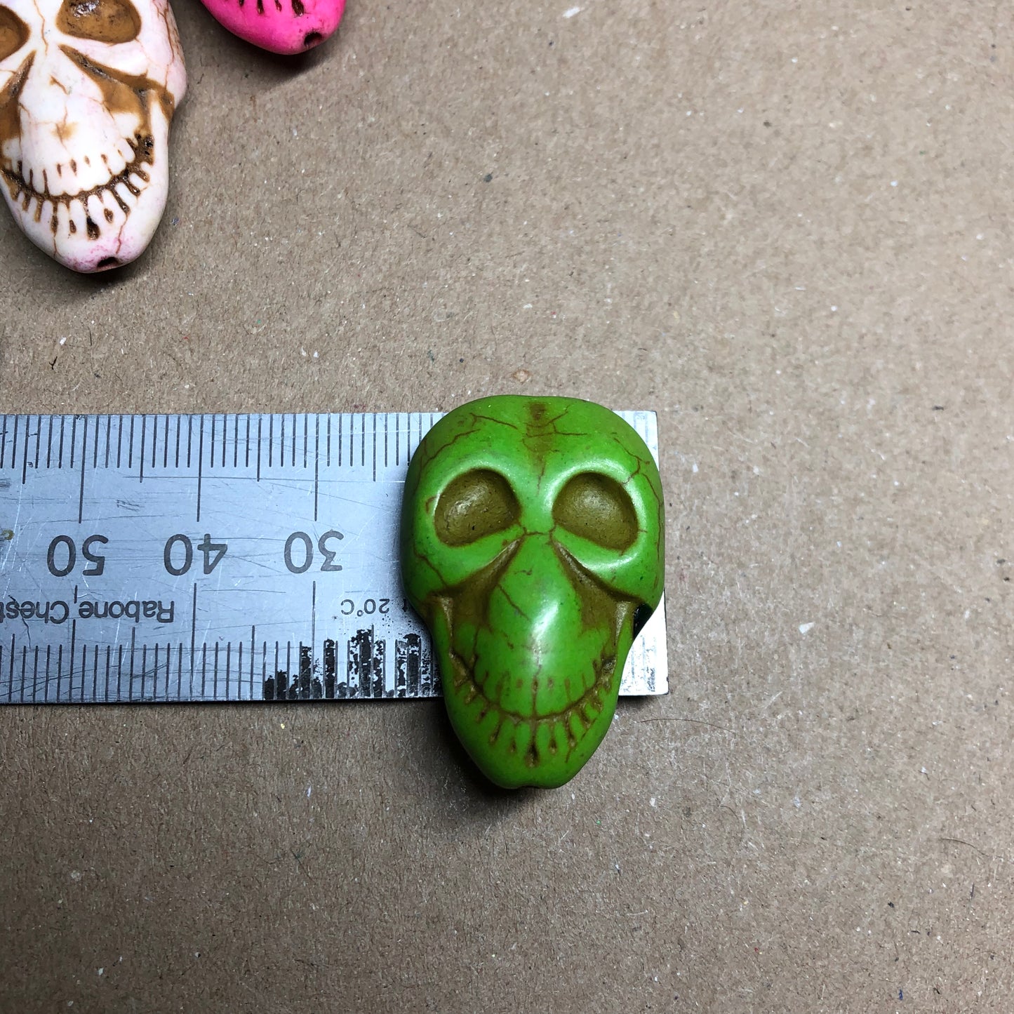 Three large Howlite skull beads