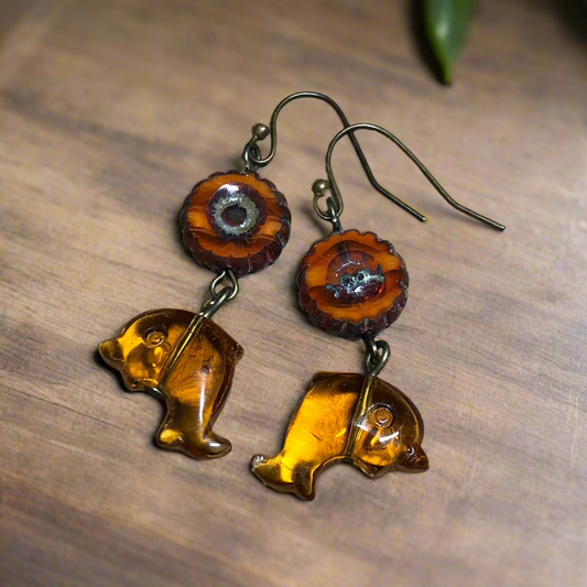 Autumn flower and glass dolphin bronze earrings