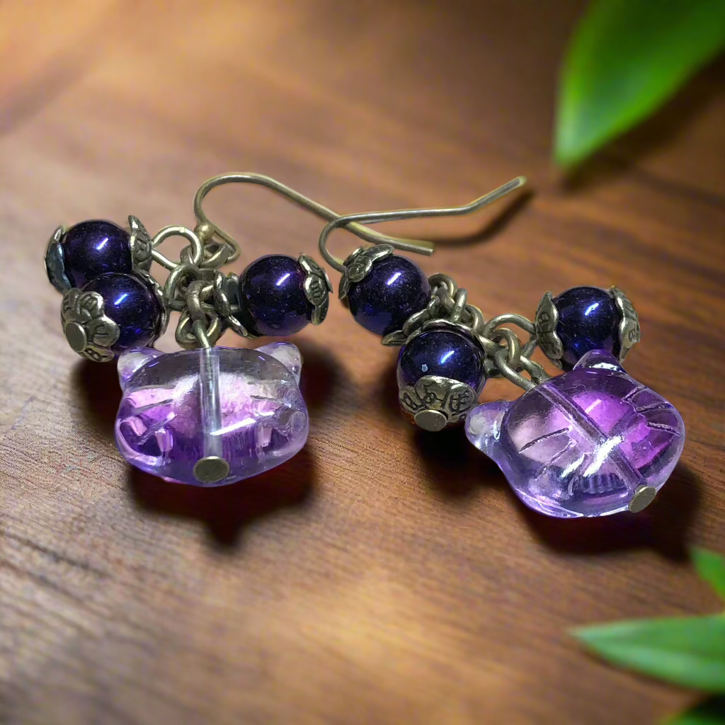 Purple glass cat cluster bronze earrings