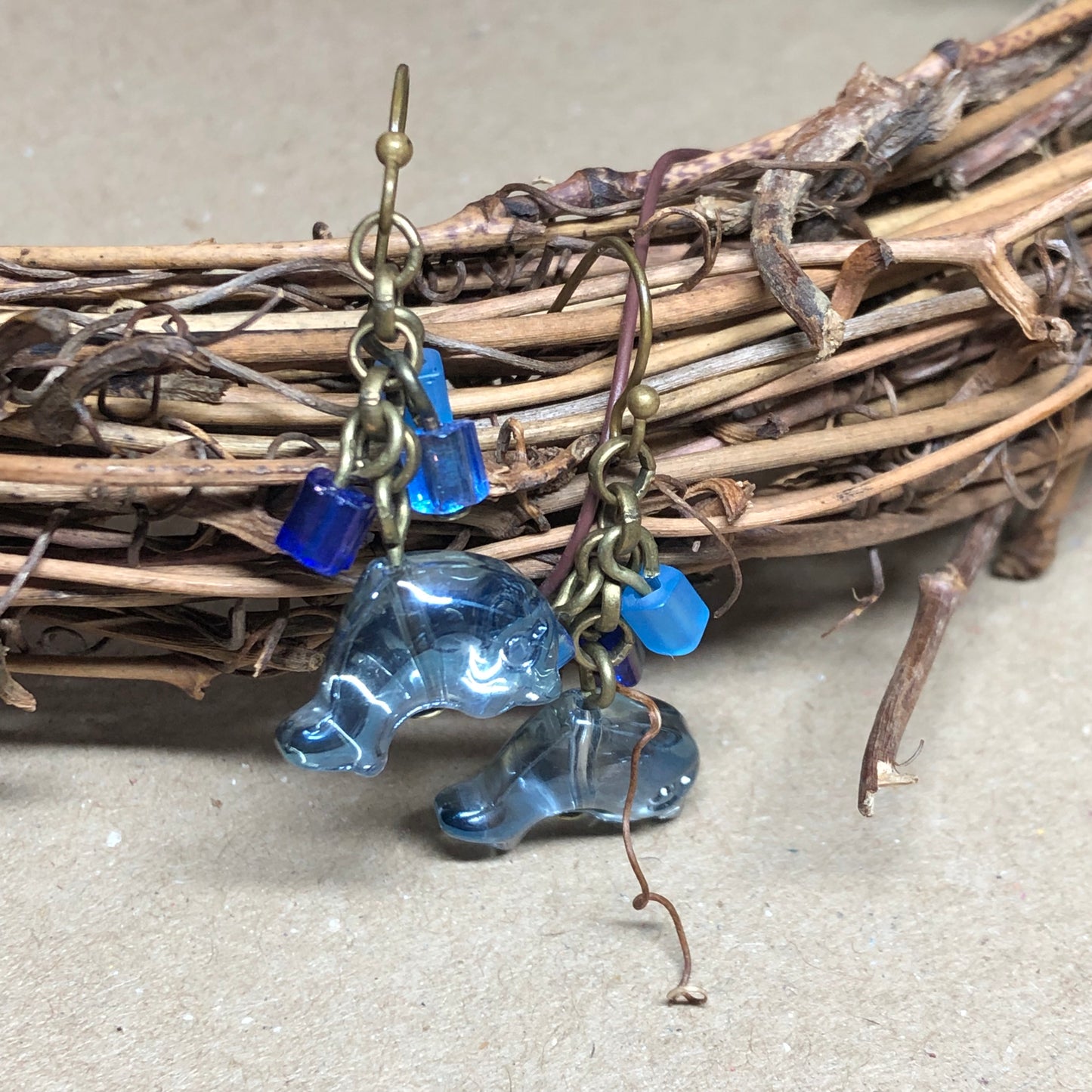 Blue glass dolphin cluster bronze earrings