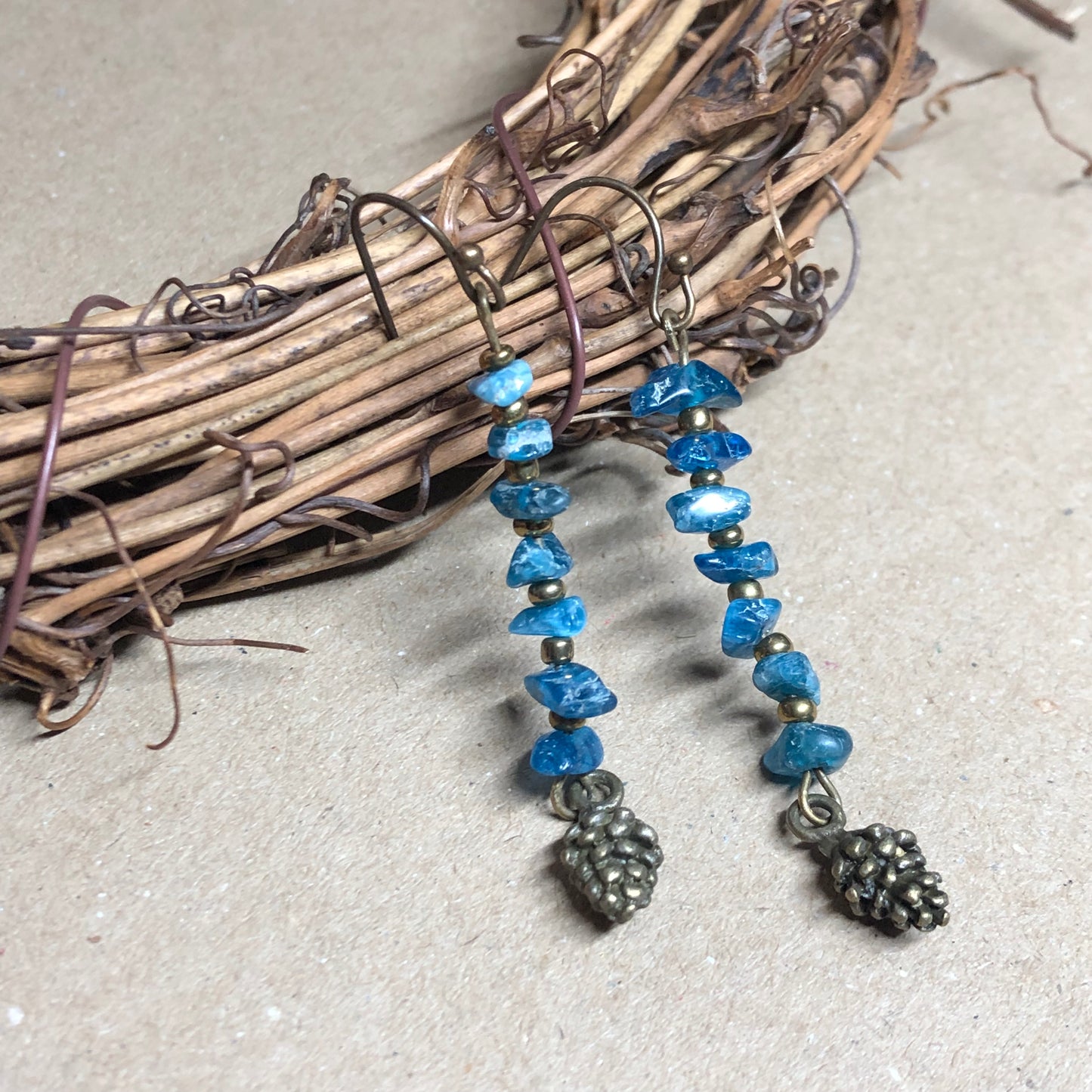 Apatite and fir cone bronze earrings