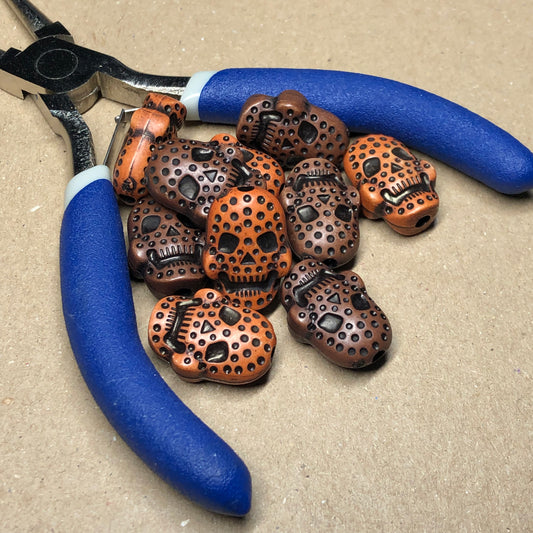 Orange and brown skull beads 8mm