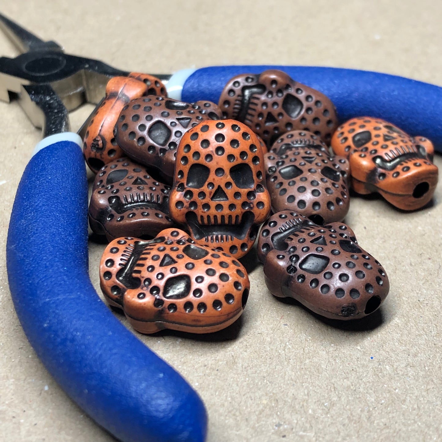 Orange and brown skull beads 8mm