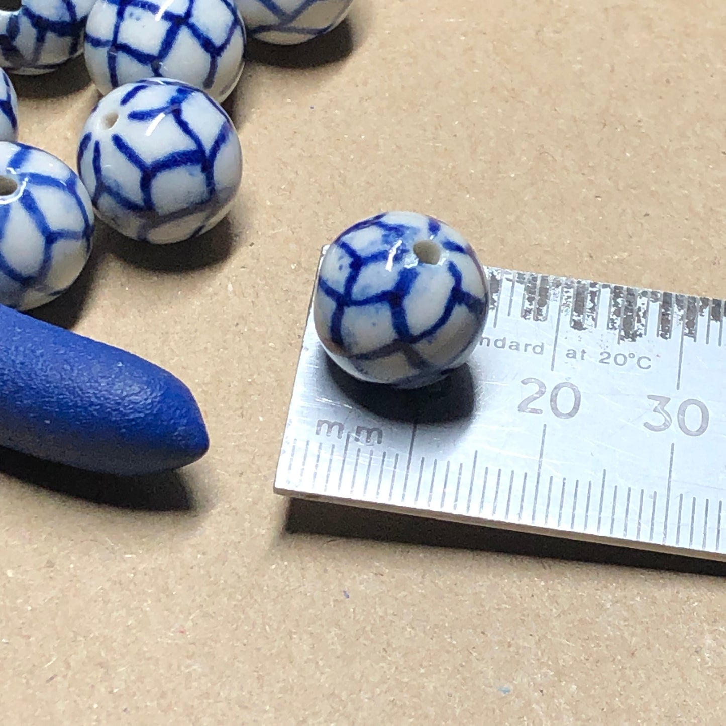 Blue chequered clay beads 12mm