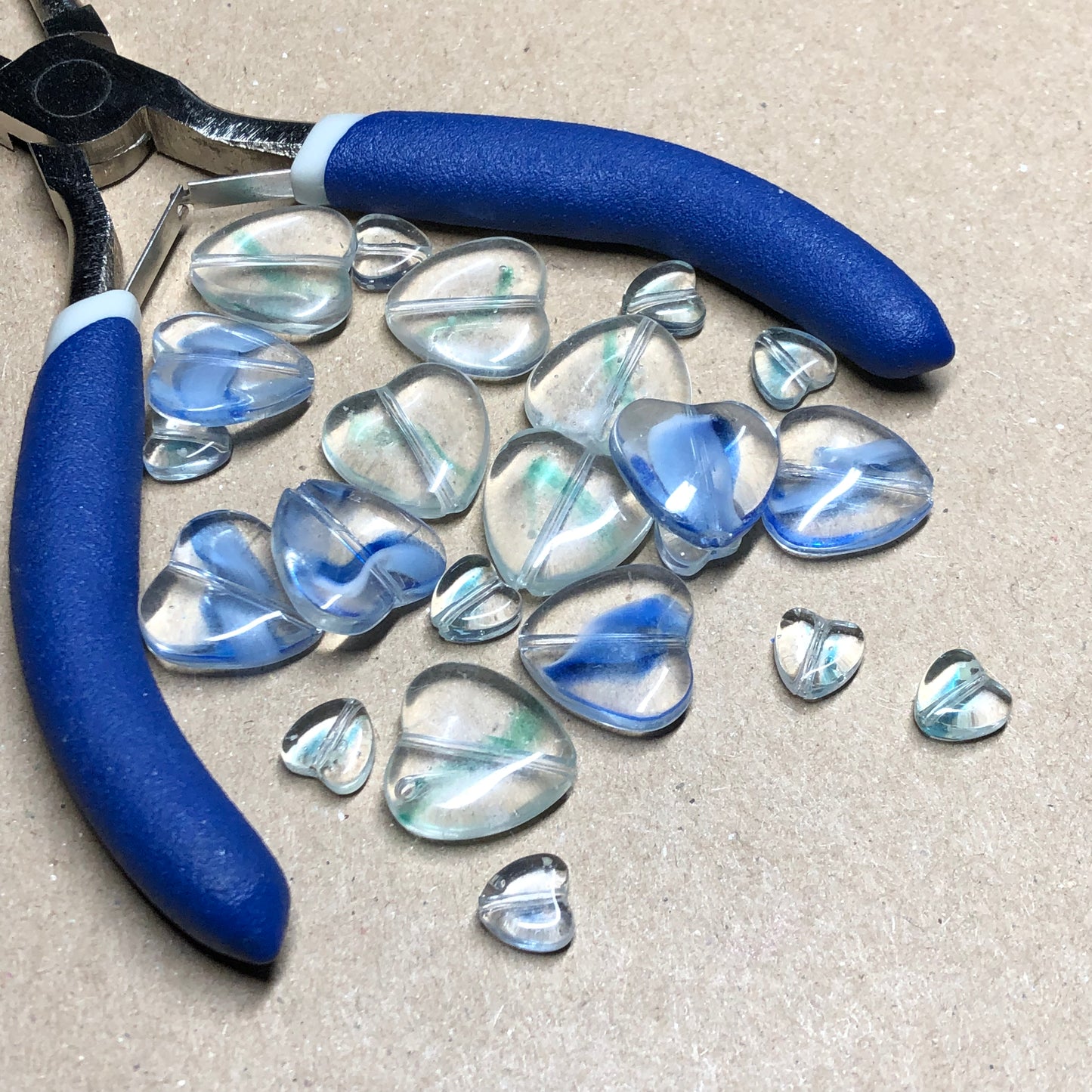 Mixed blue heart shaped glass beads