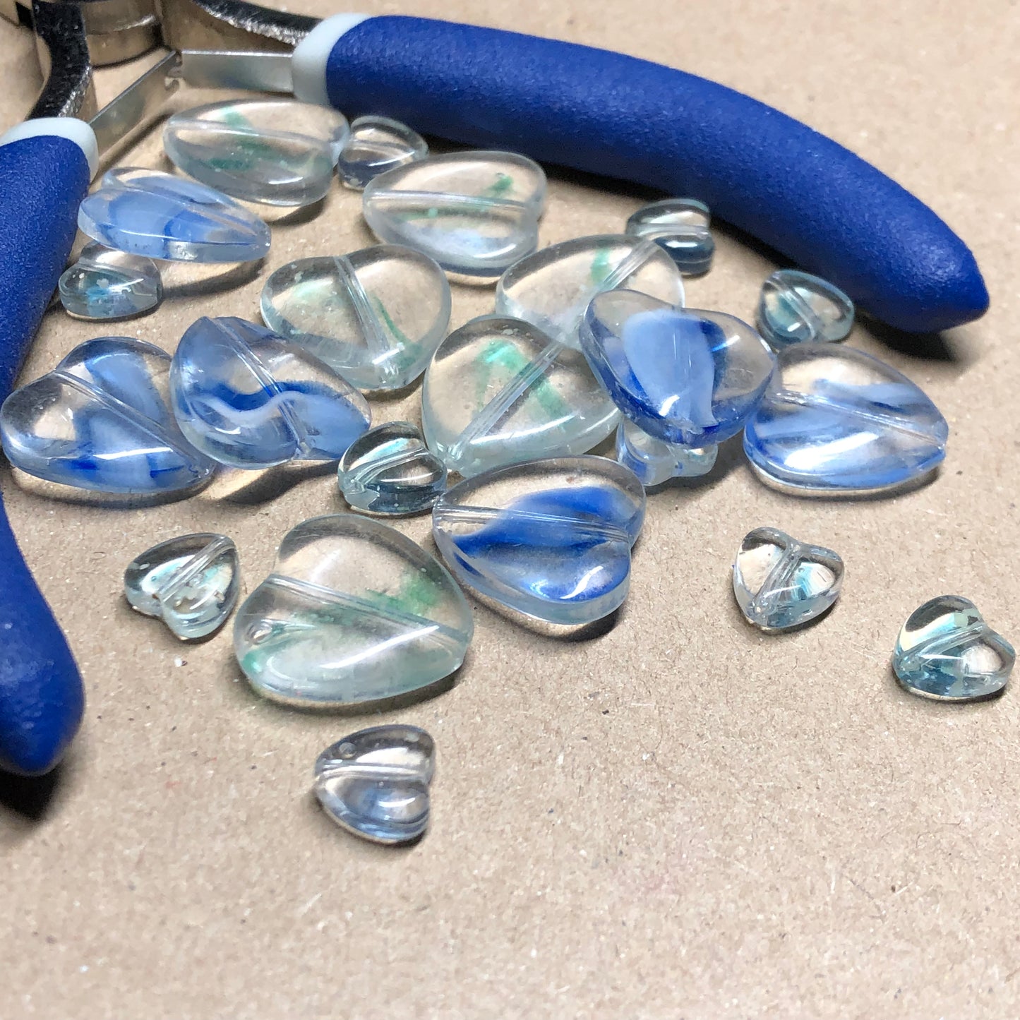 Mixed blue heart shaped glass beads