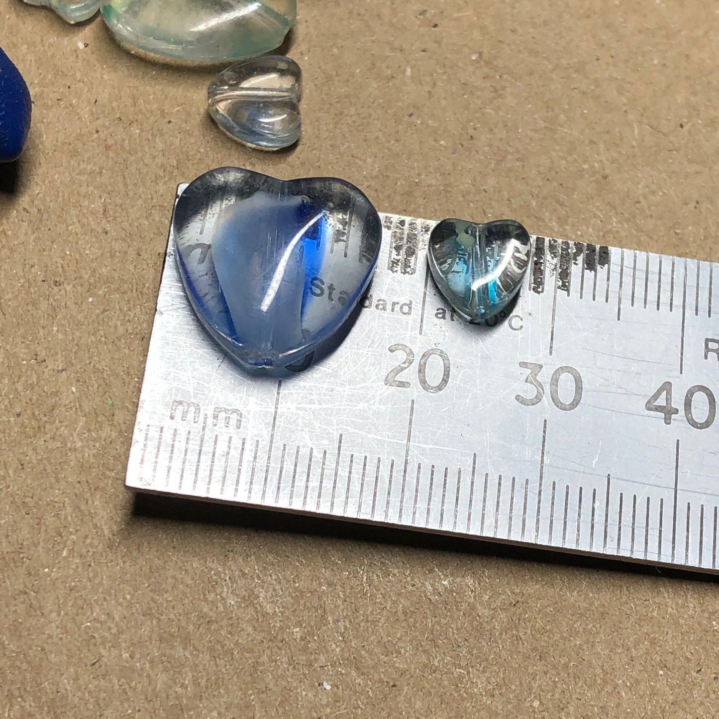 Mixed blue heart shaped glass beads