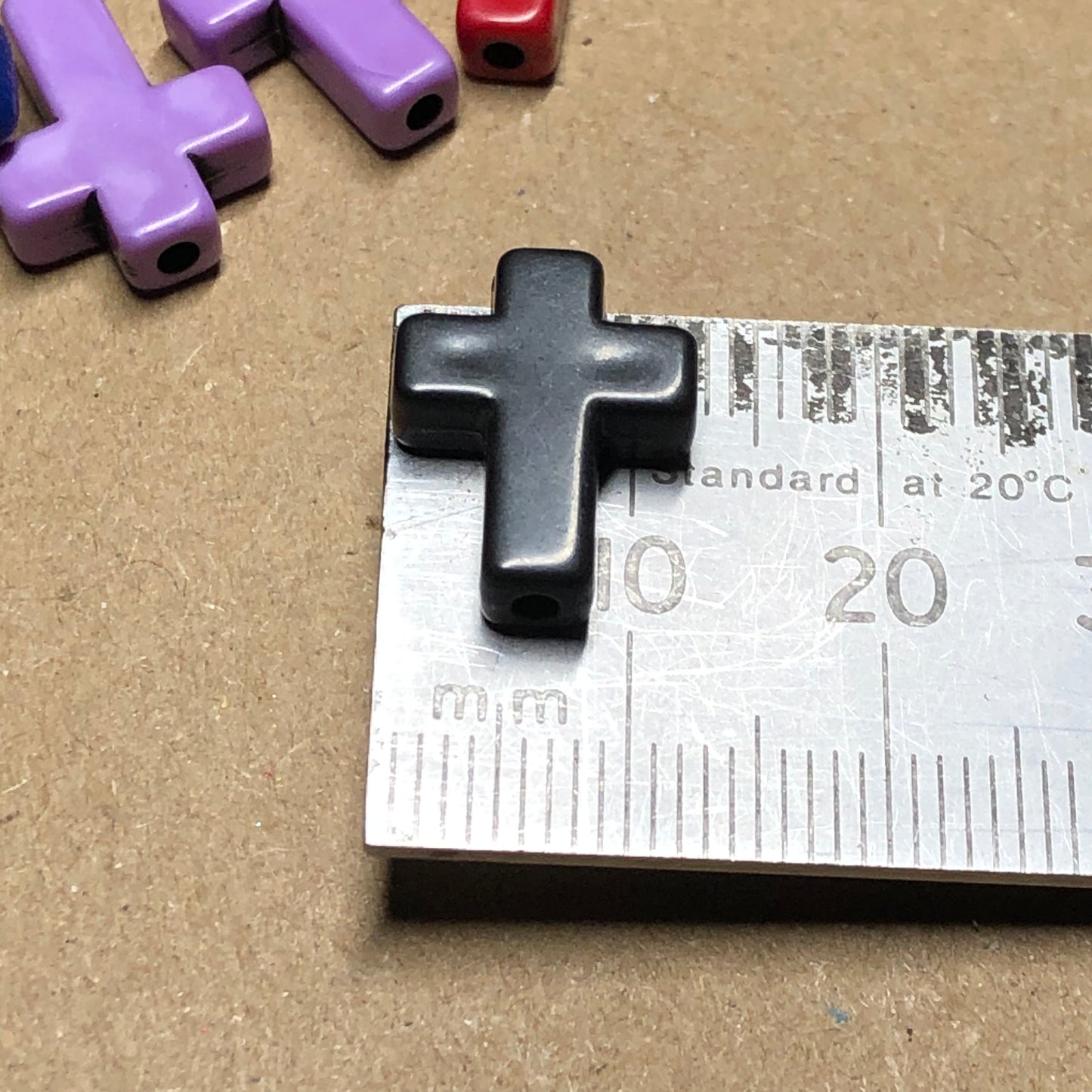 Dark crucifix acrylic beads