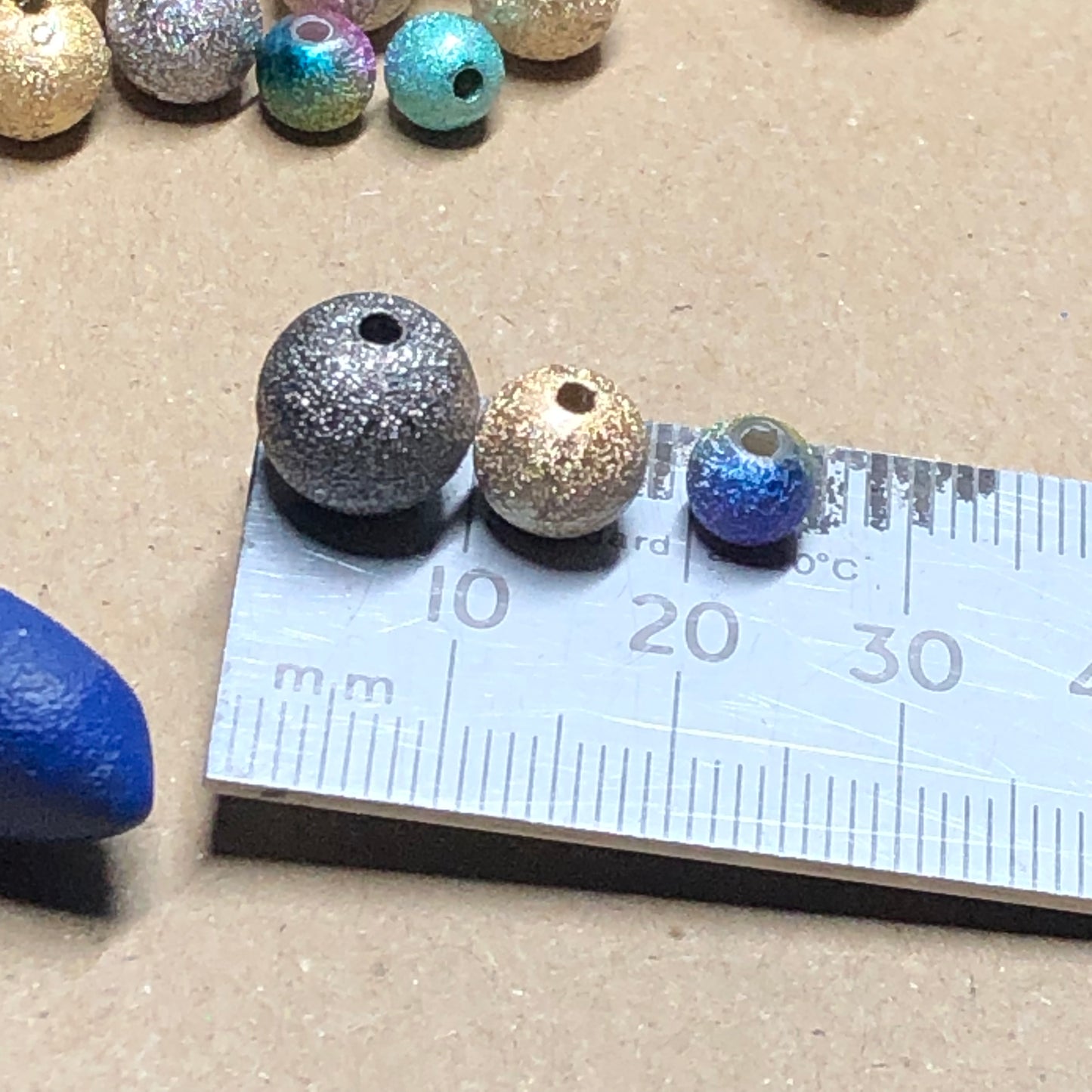 Mixed stardust acrylic beads