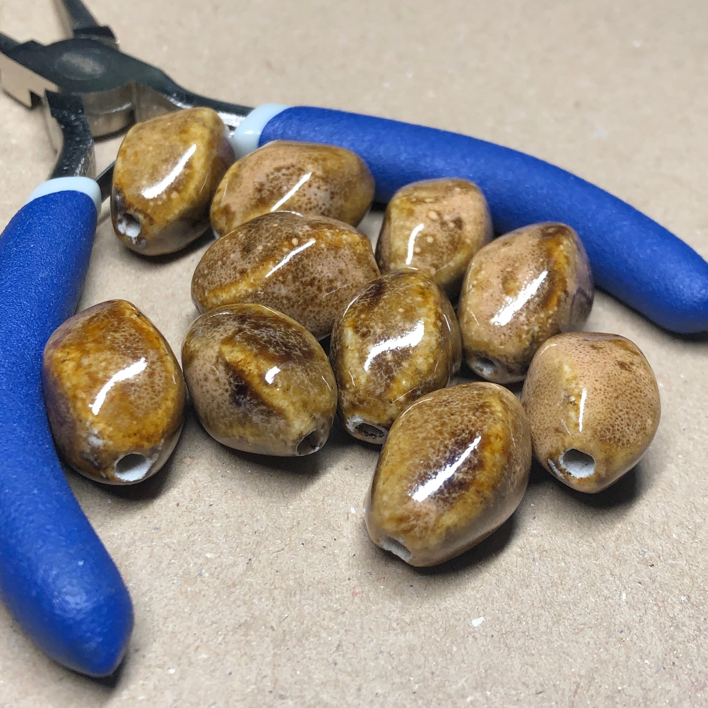 Brown dragon egg clay beads