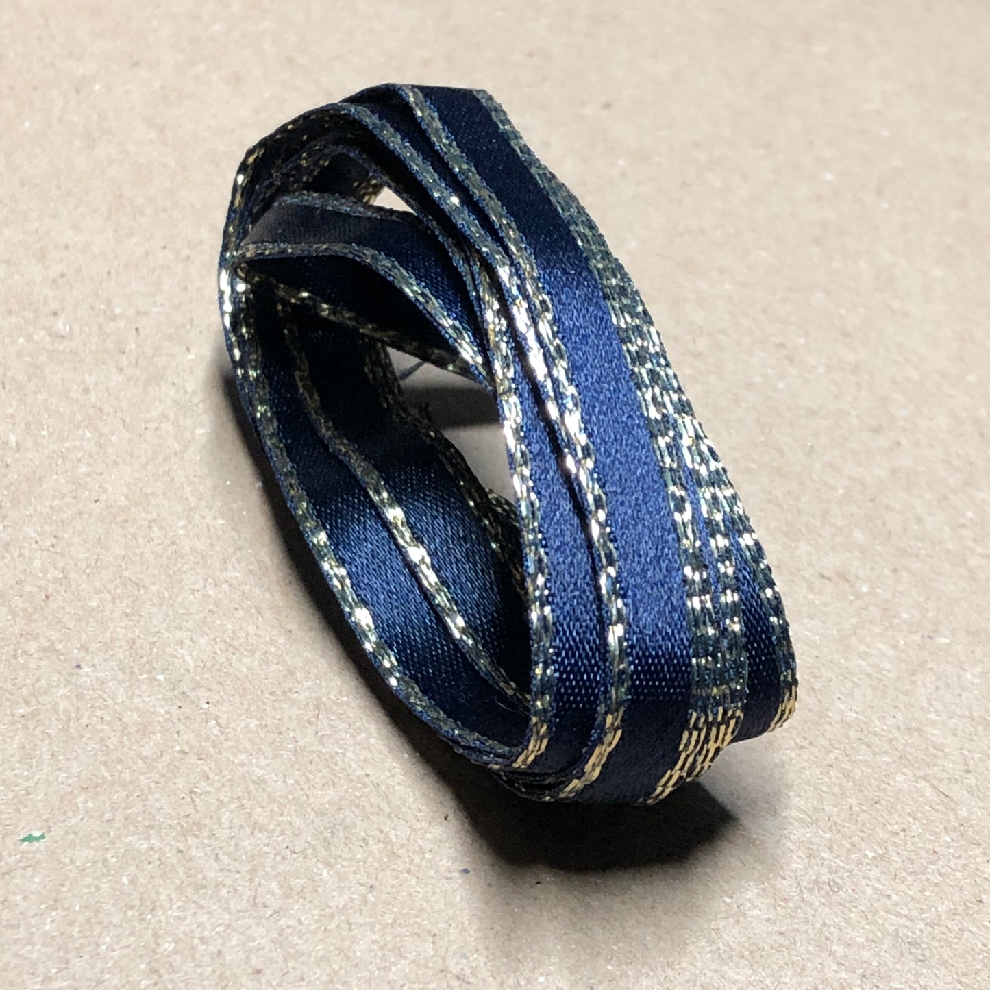 Gold edged navy blue satin ribbon 1.5m