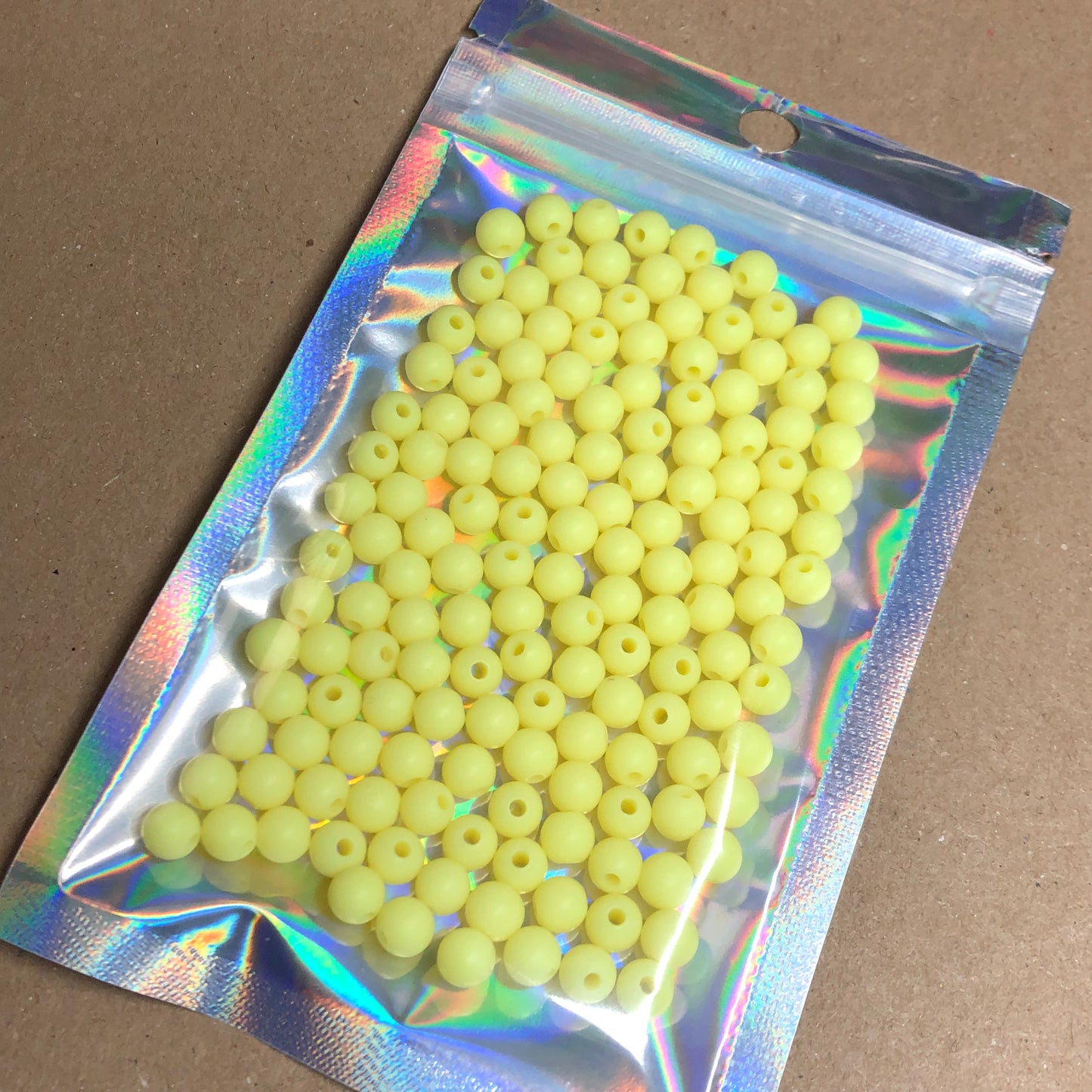 Bright yellow small acrylic beads