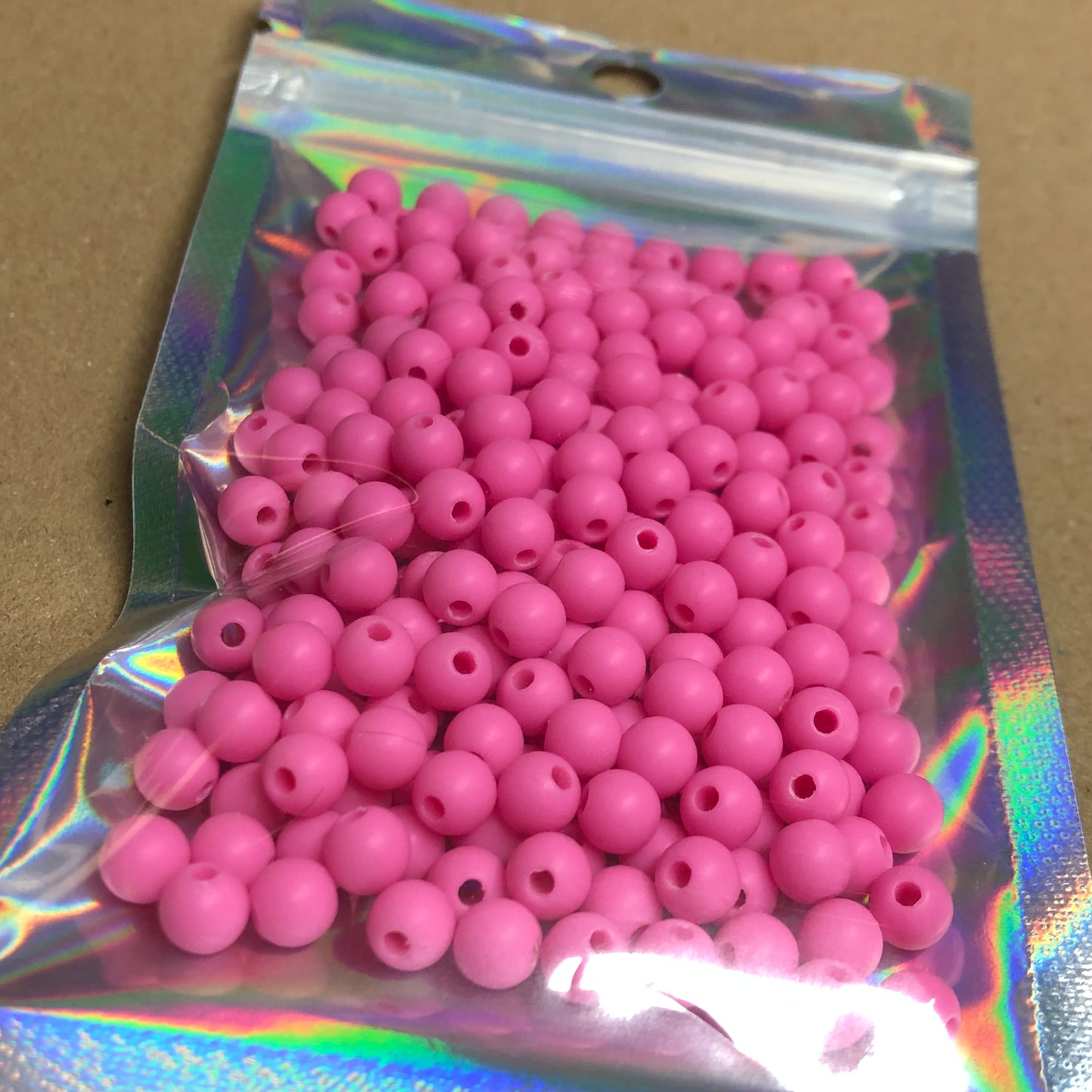 Bright pink small acrylic beads