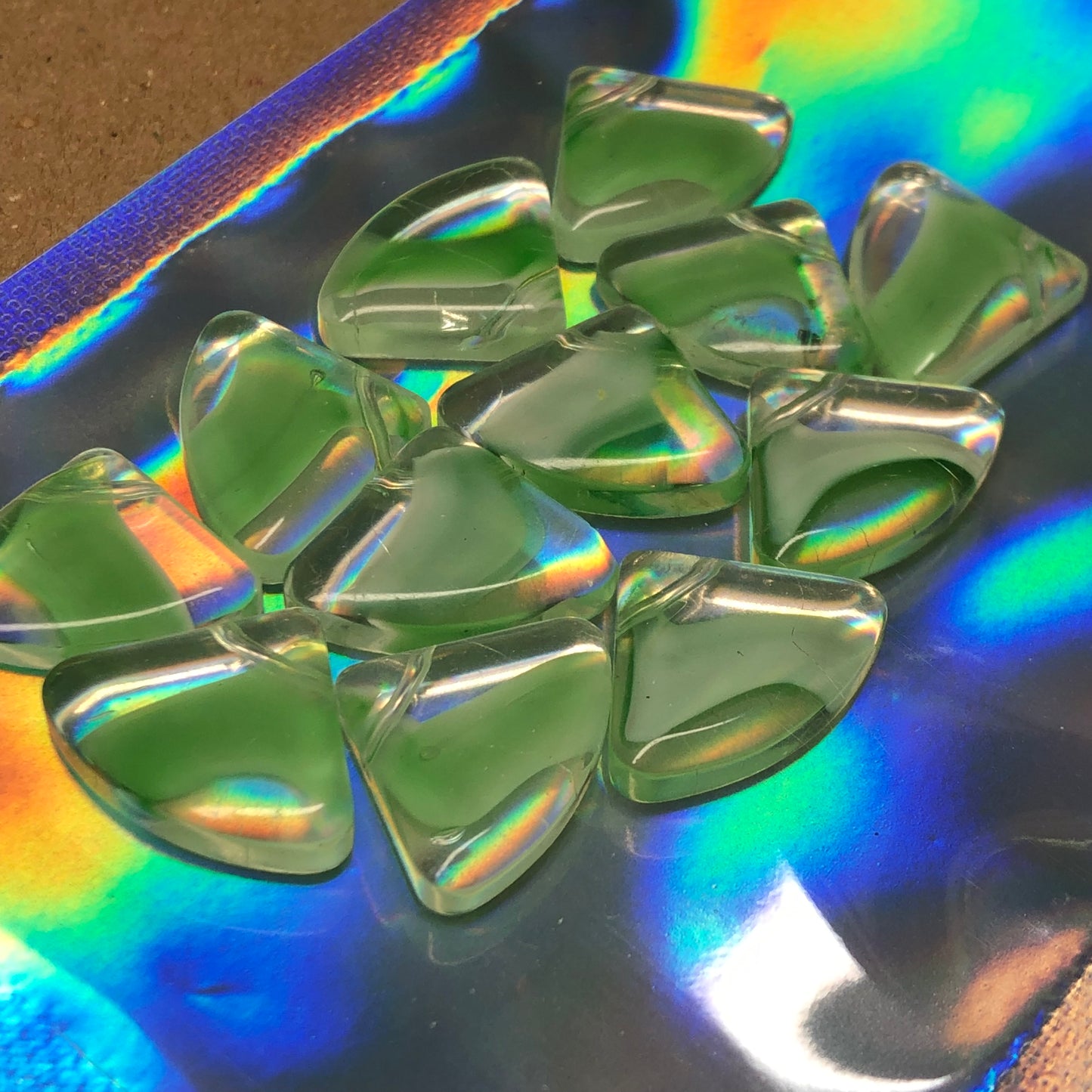 Green fan shaped glass beads