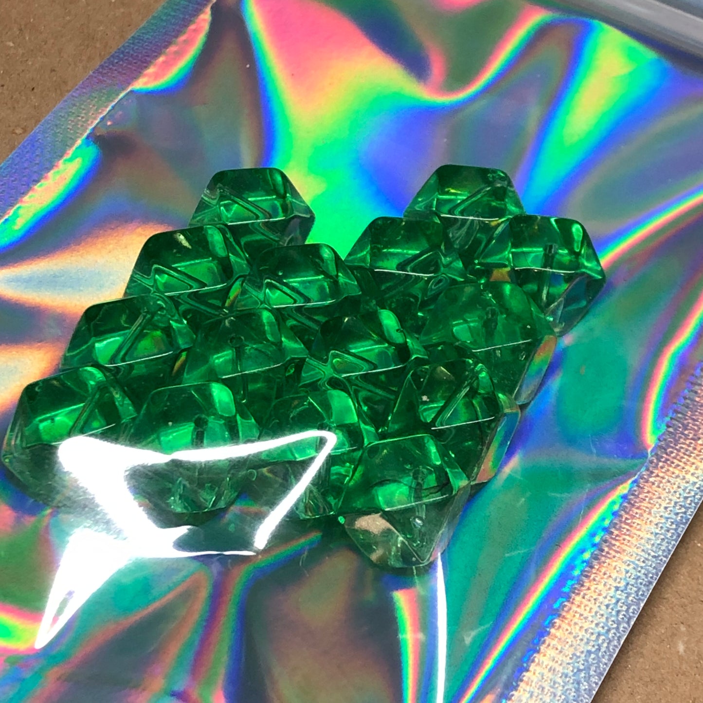 Green faceted cube shaped glass beads