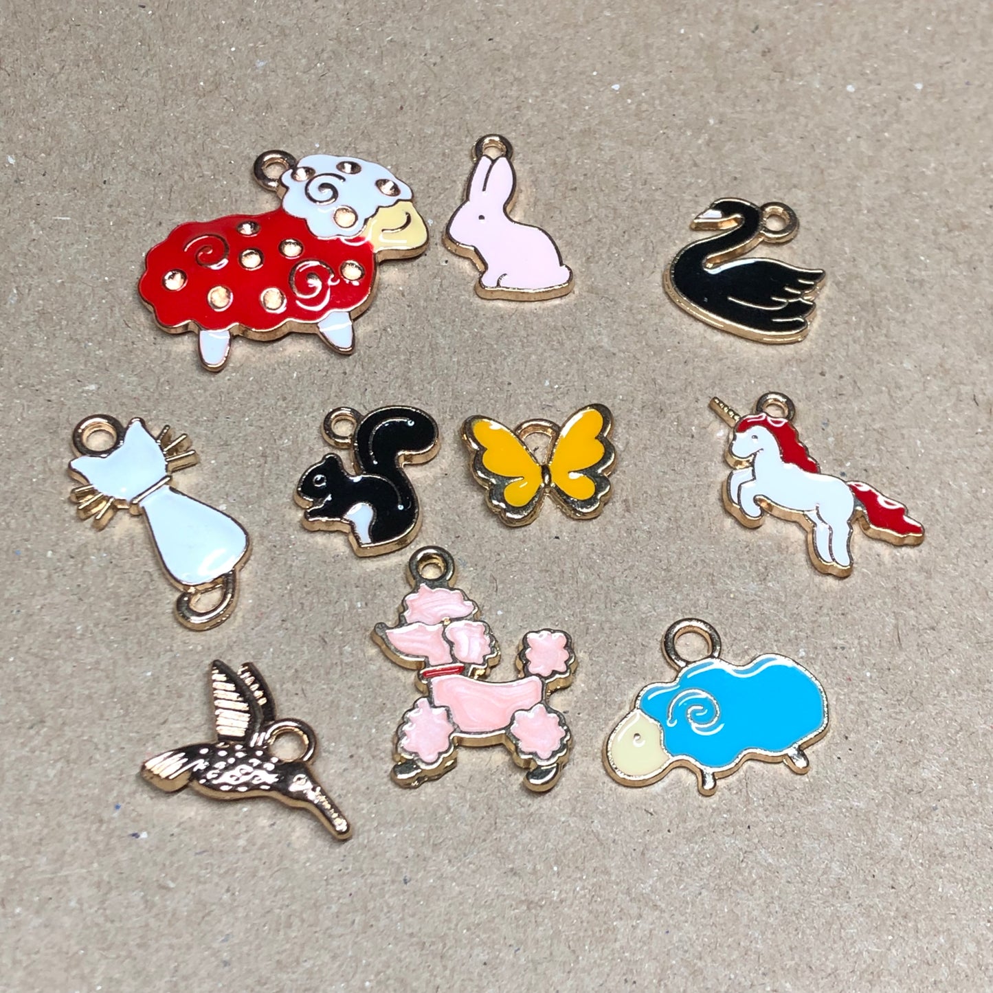 Ten gold and enamel animal charms