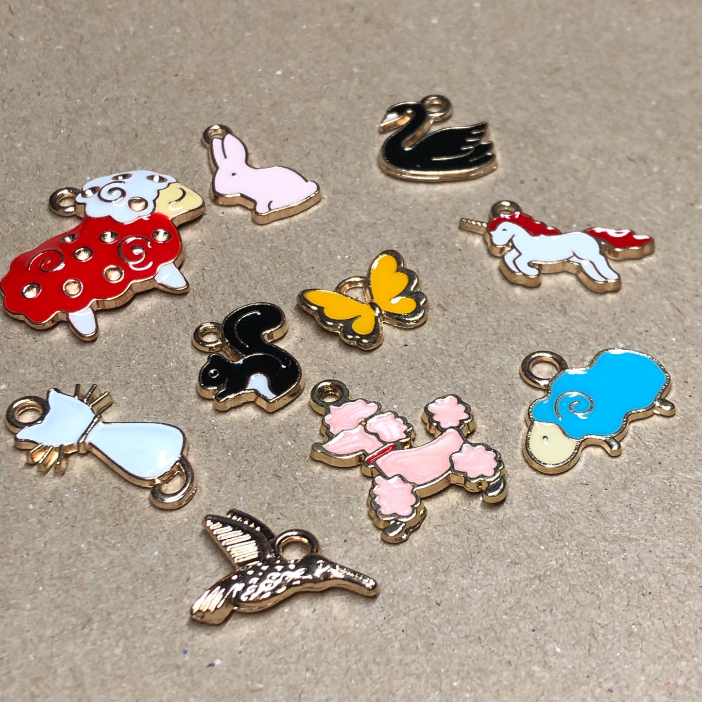 Ten gold and enamel animal charms