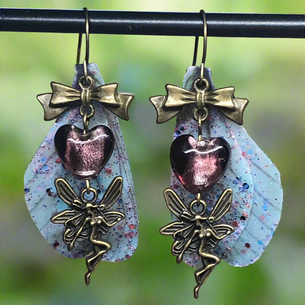 Bronze fairy wing earrings with plum hearts