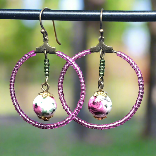 Lucinda - Pink glass hoop earrings with floral porcelain beads