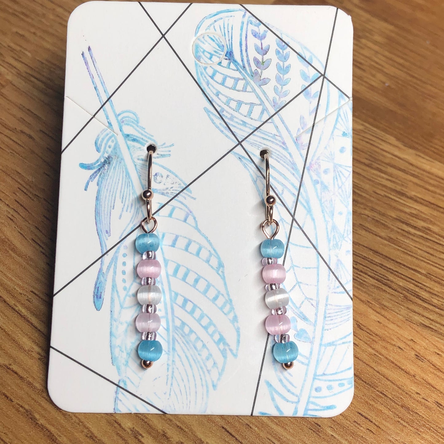 Trans Perfect - pastel pink cats eye glass earrings