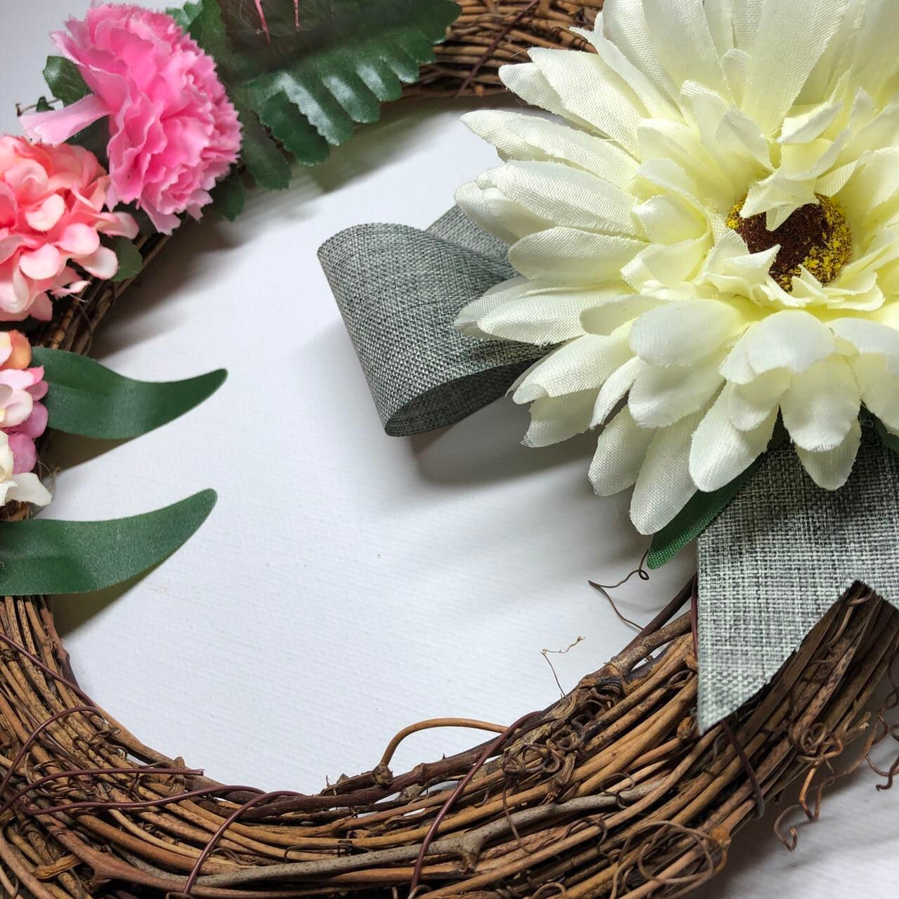 Willow cream floral hanging wreath decoration.