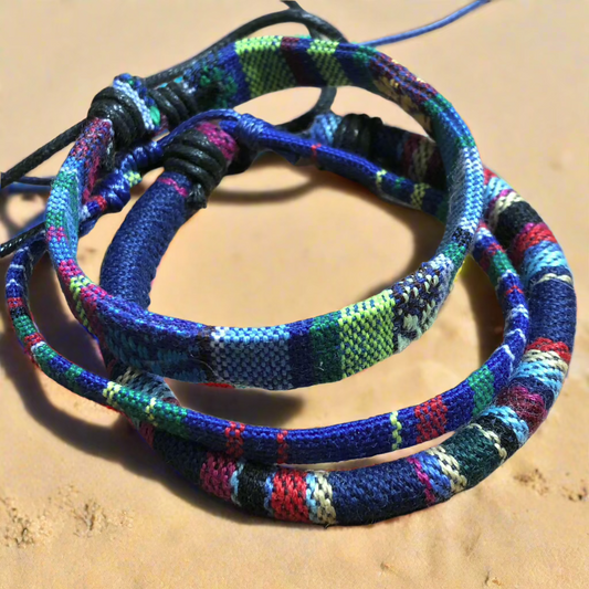 Three blue handmade multicolour string cord braided woven stackable bracelets